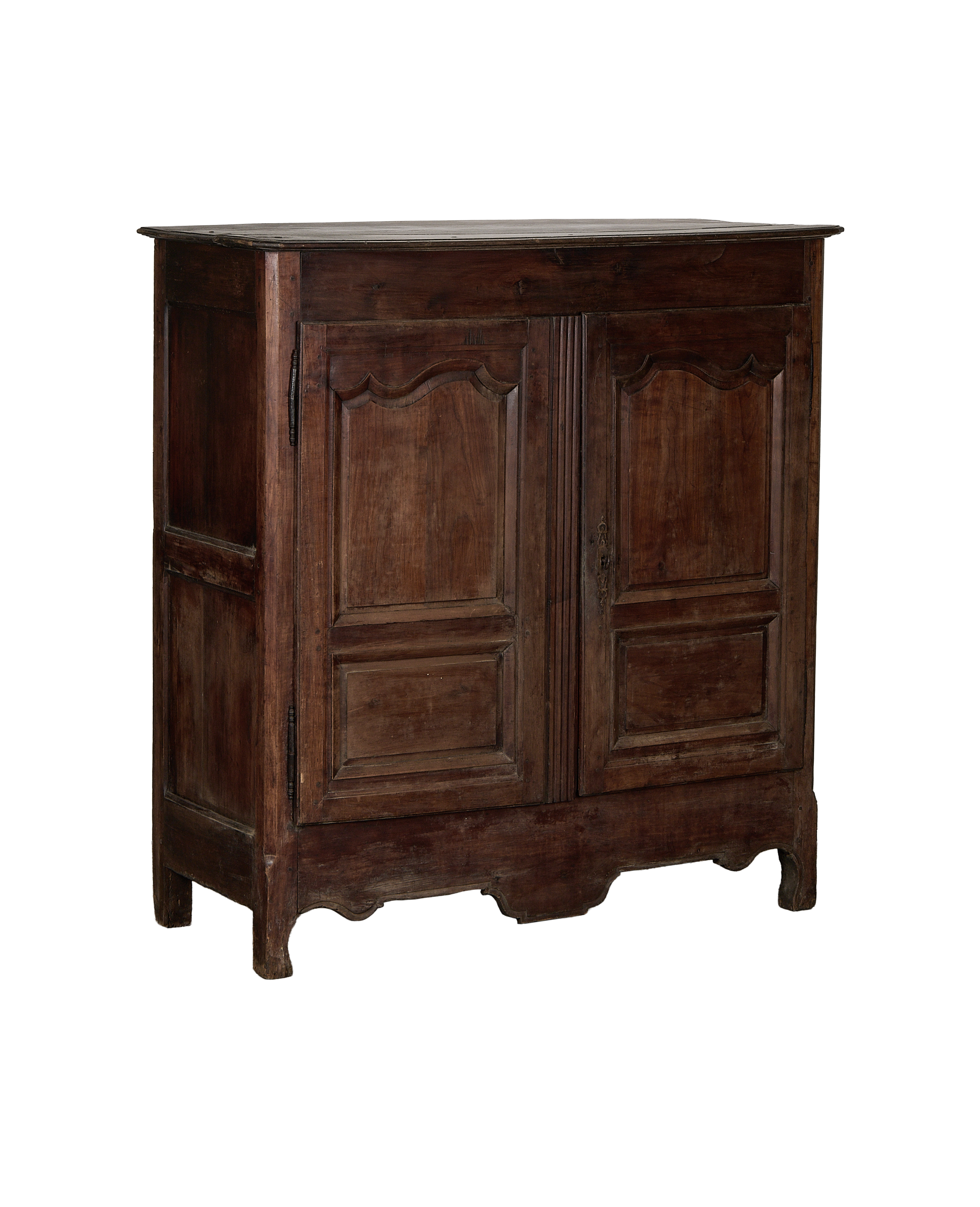 Vintage French oak armoire, detailed view of paneled doors, aged dark wood finish.