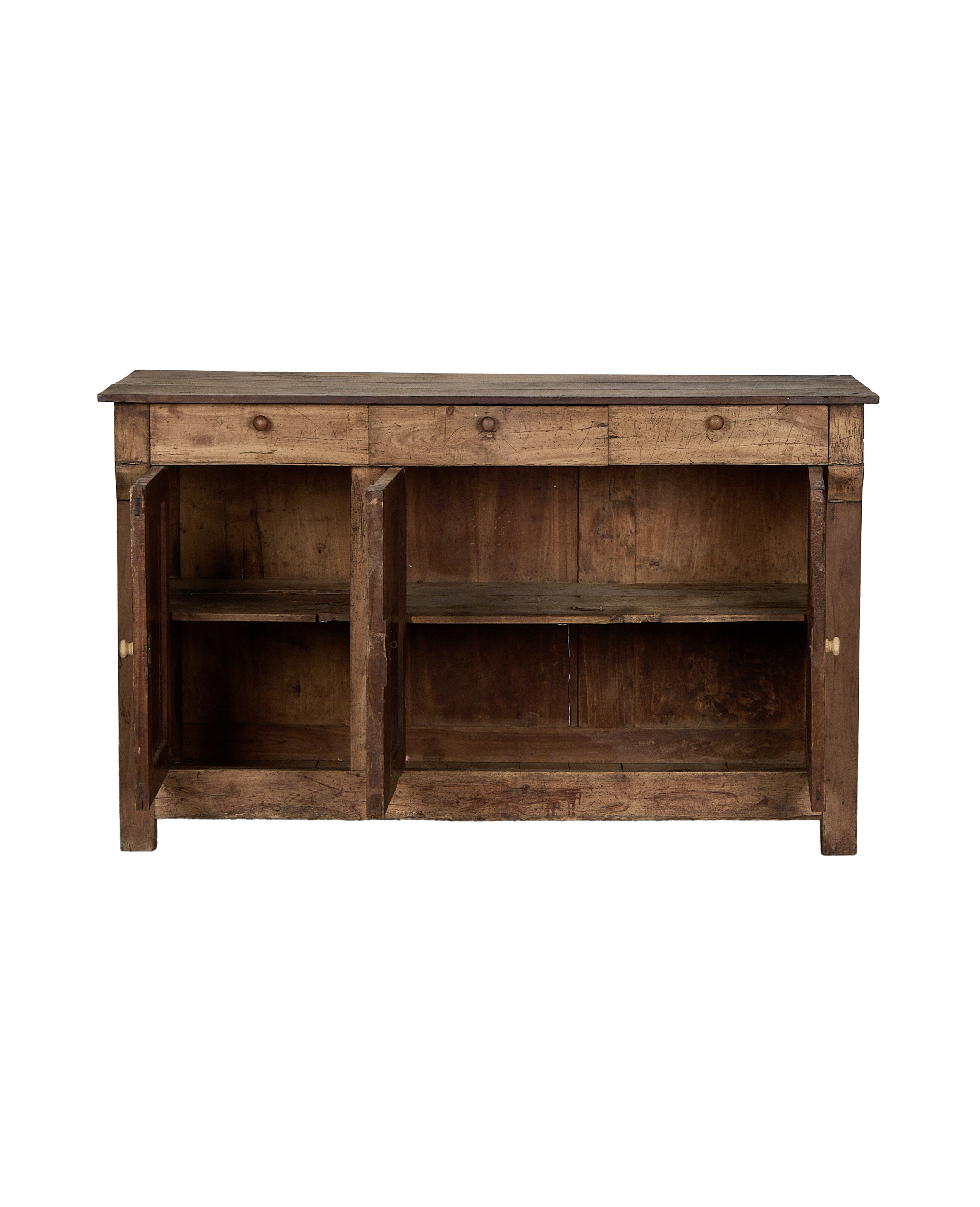 Vintage French oak sideboard with doors open, revealing two shelves within each compartment.