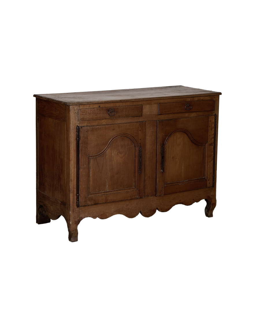 Vintage French oak sideboard, showing the full front display with ornate hinges and scallop apron.