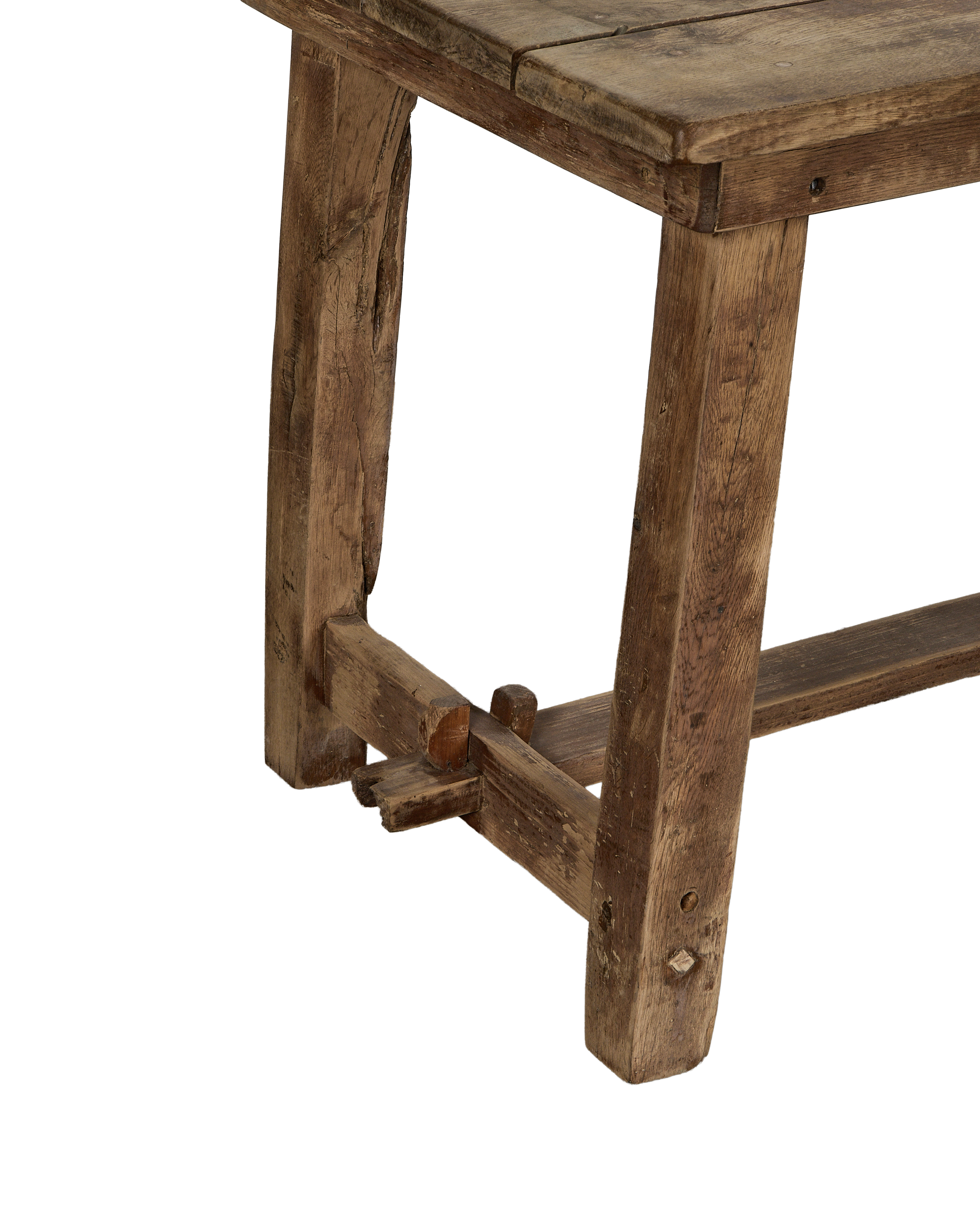 Vintage French oak work table corner, showing authentic mortise-and-tenon construction.