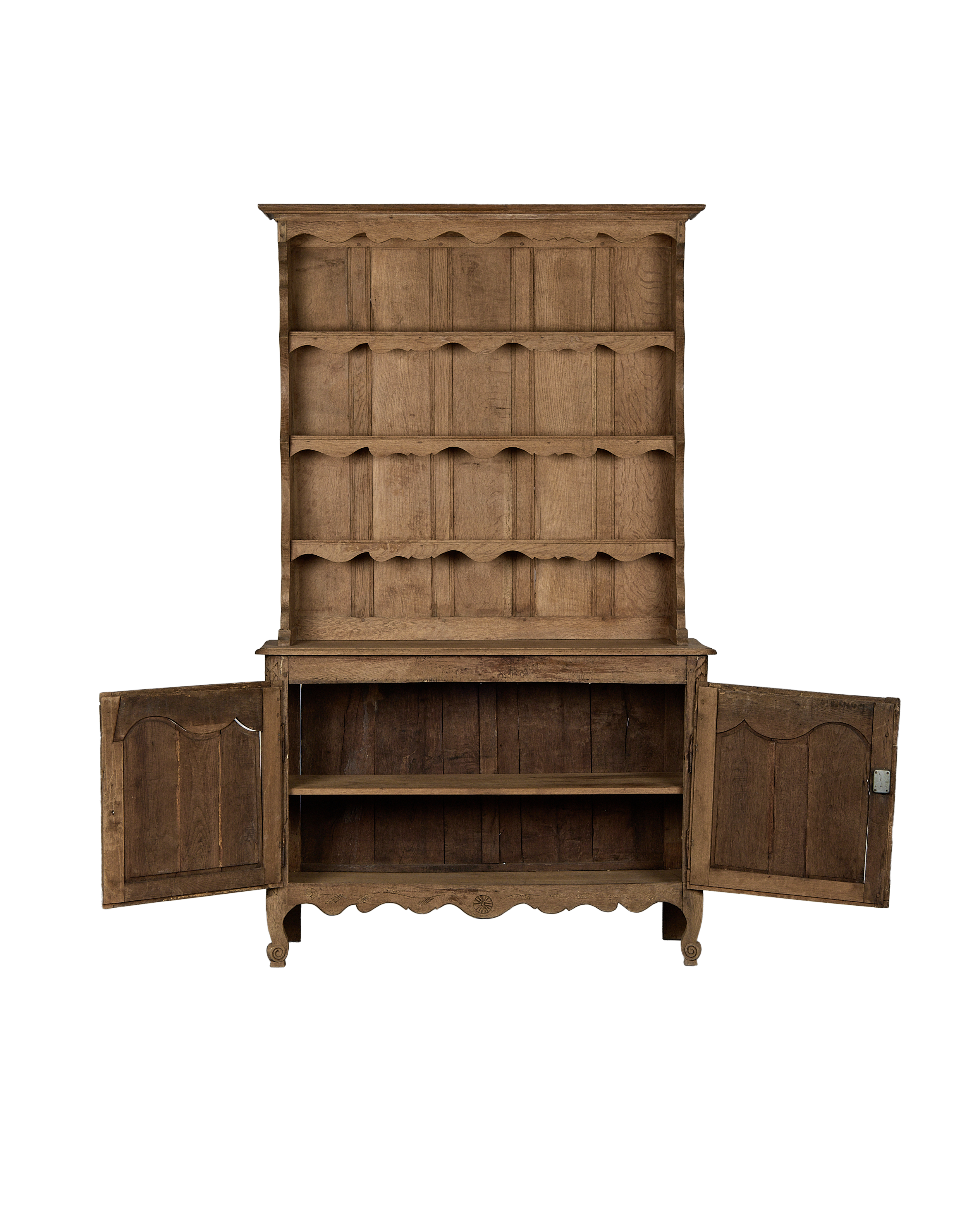 Vintage French oak china cabinet with open doors and shelves, showcasing interior storage.