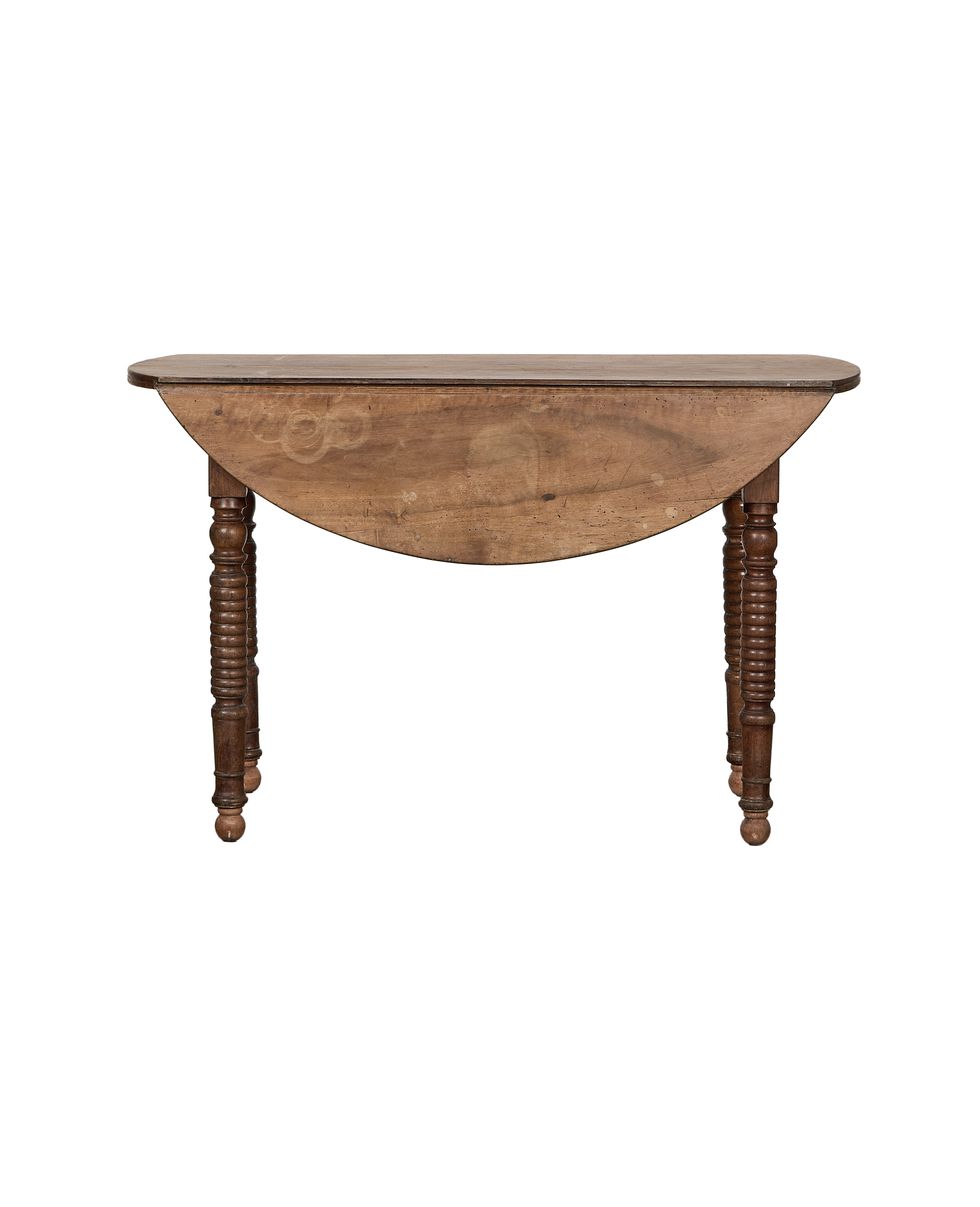 Vintage French oak drop leaf table, light wood, with turned, dark brown legs.