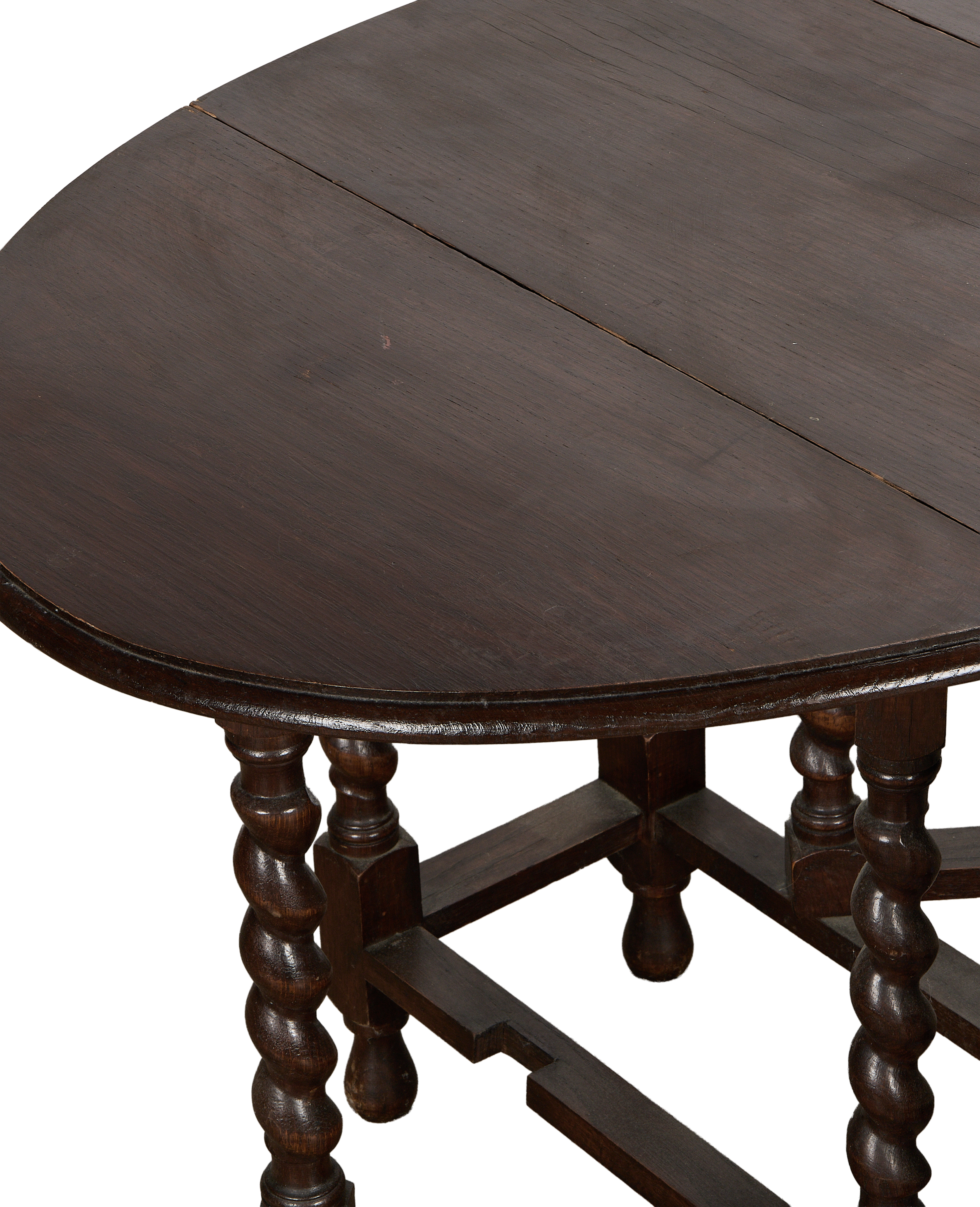 Vintage French oak drop leaf table, barley twist legs, dark wood grain top from above.