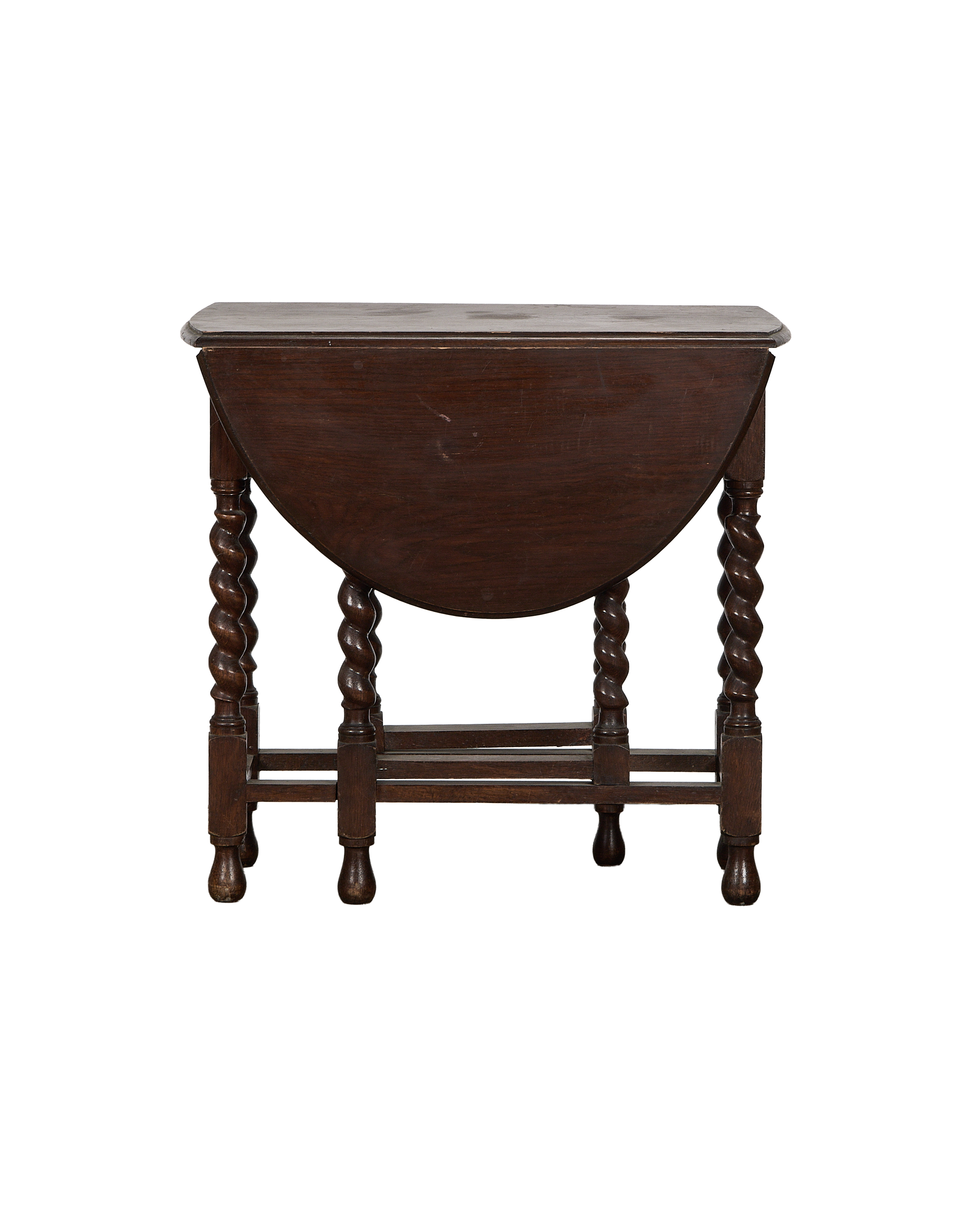Vintage French oak barley twist drop leaf table, leaves folded, showing intricate turned legs.