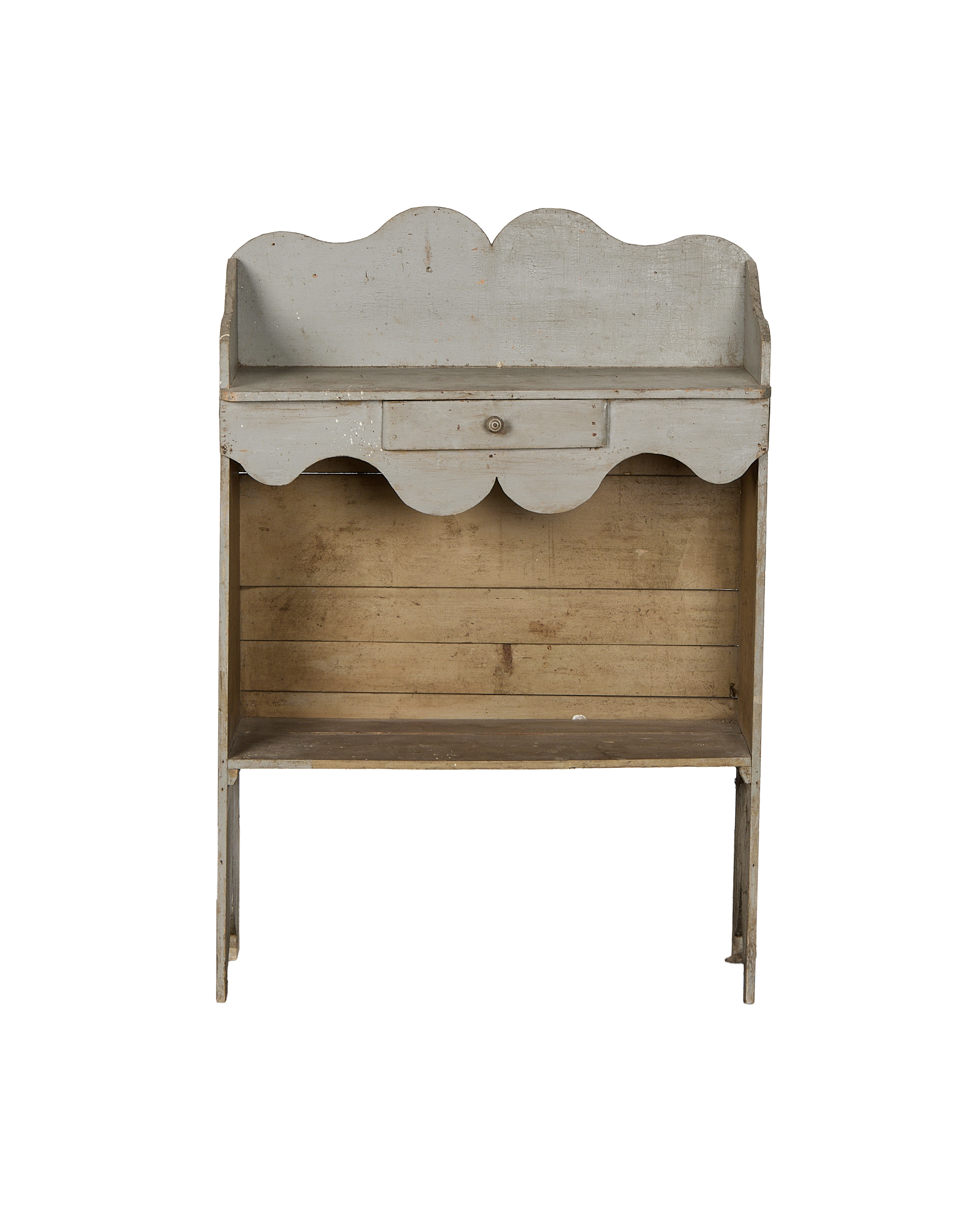 Vintage French oak scalloped shelving unit, painted light gray, with single drawer.