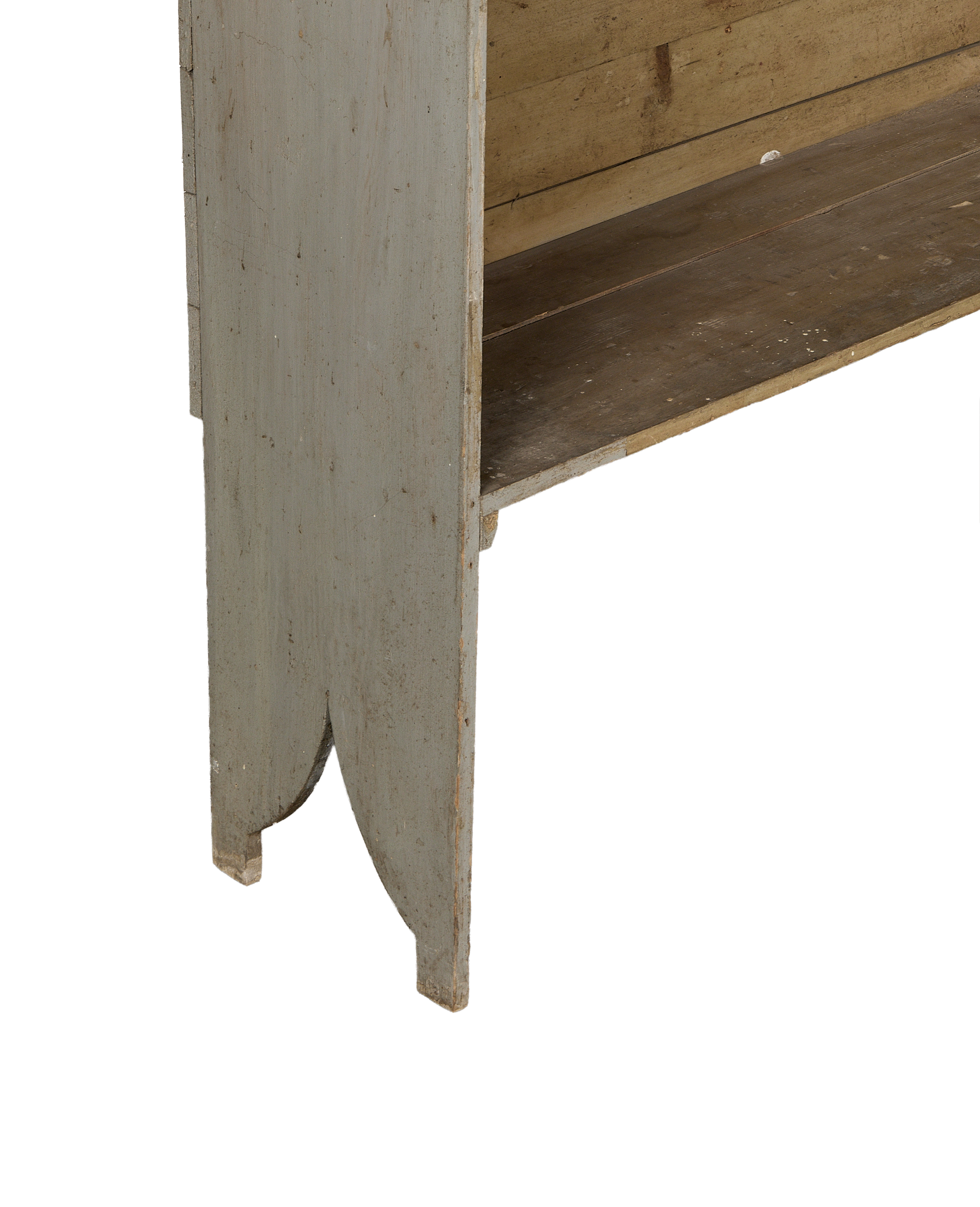 Vintage French oak scalloped shelving detail, showing gray painted wood and natural texture.