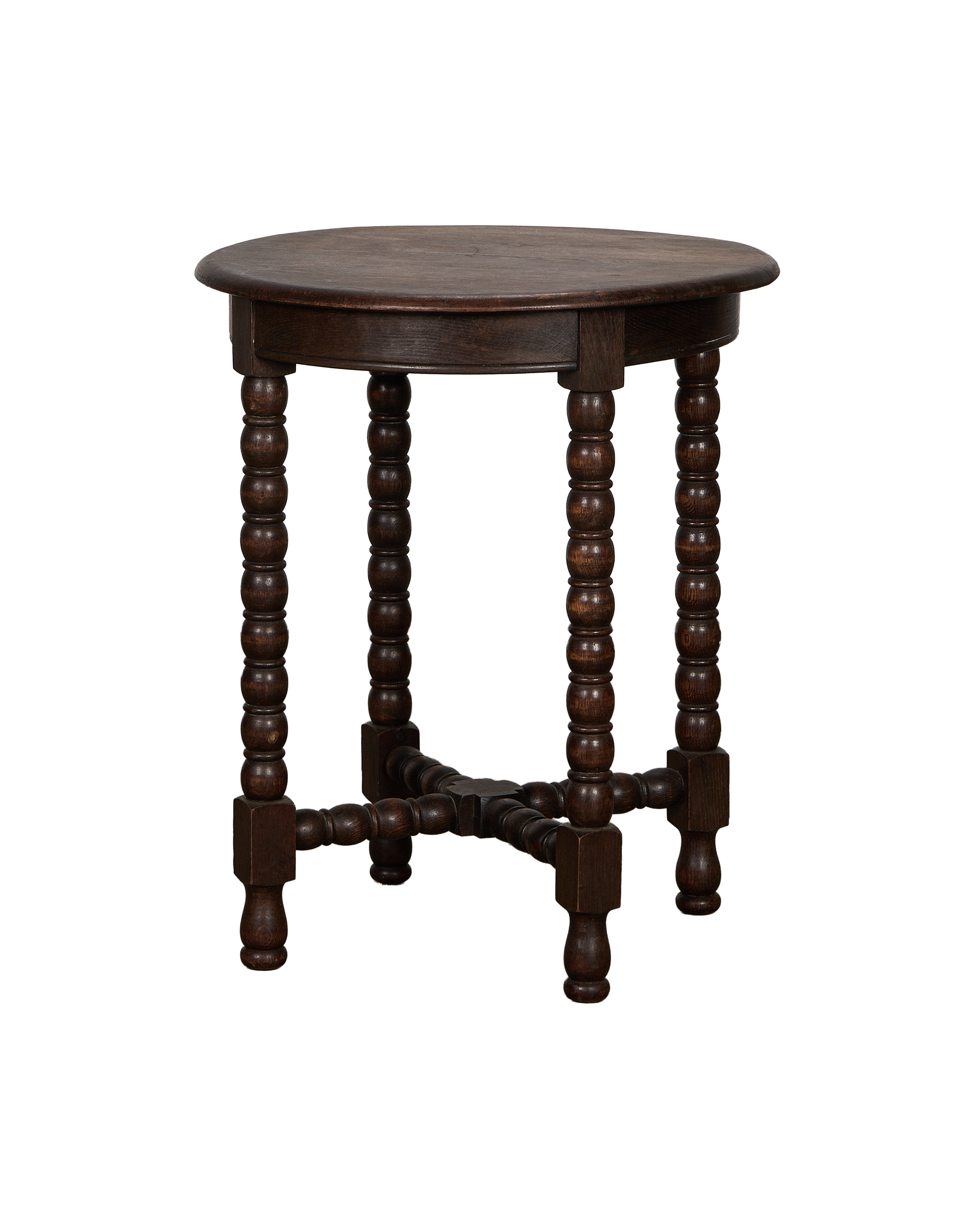 Vintage French oak bobbin side table with round top and turned legs.