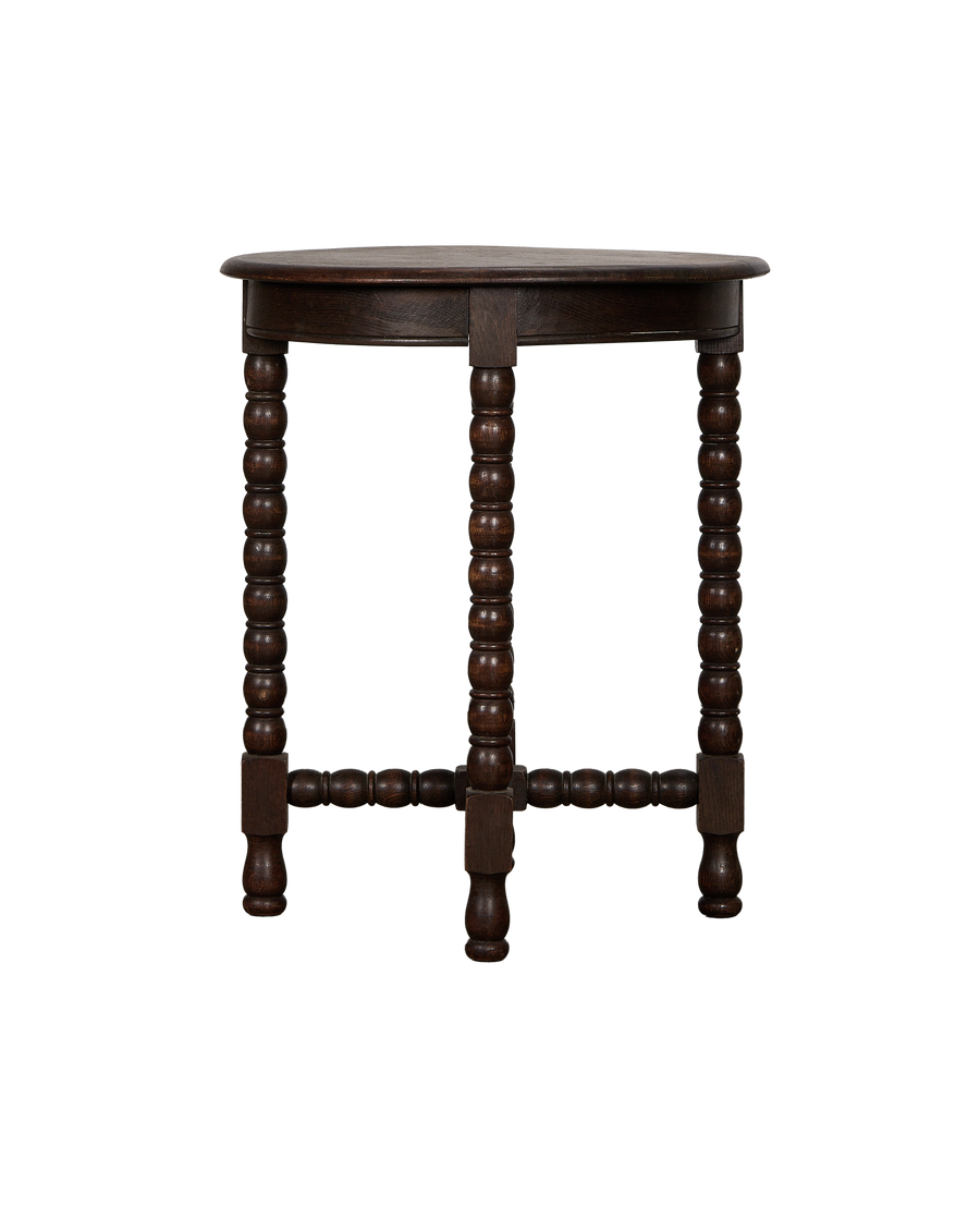 Vintage French bobbin-leg oak side table, full front view displaying dark wood finish.