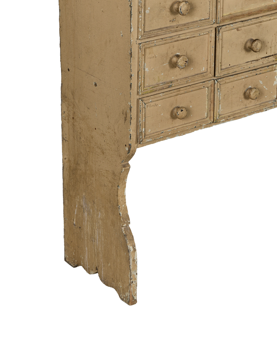 Vintage French oak painted apothecary console's right side showcasing multiple drawers and distressed paint finish.