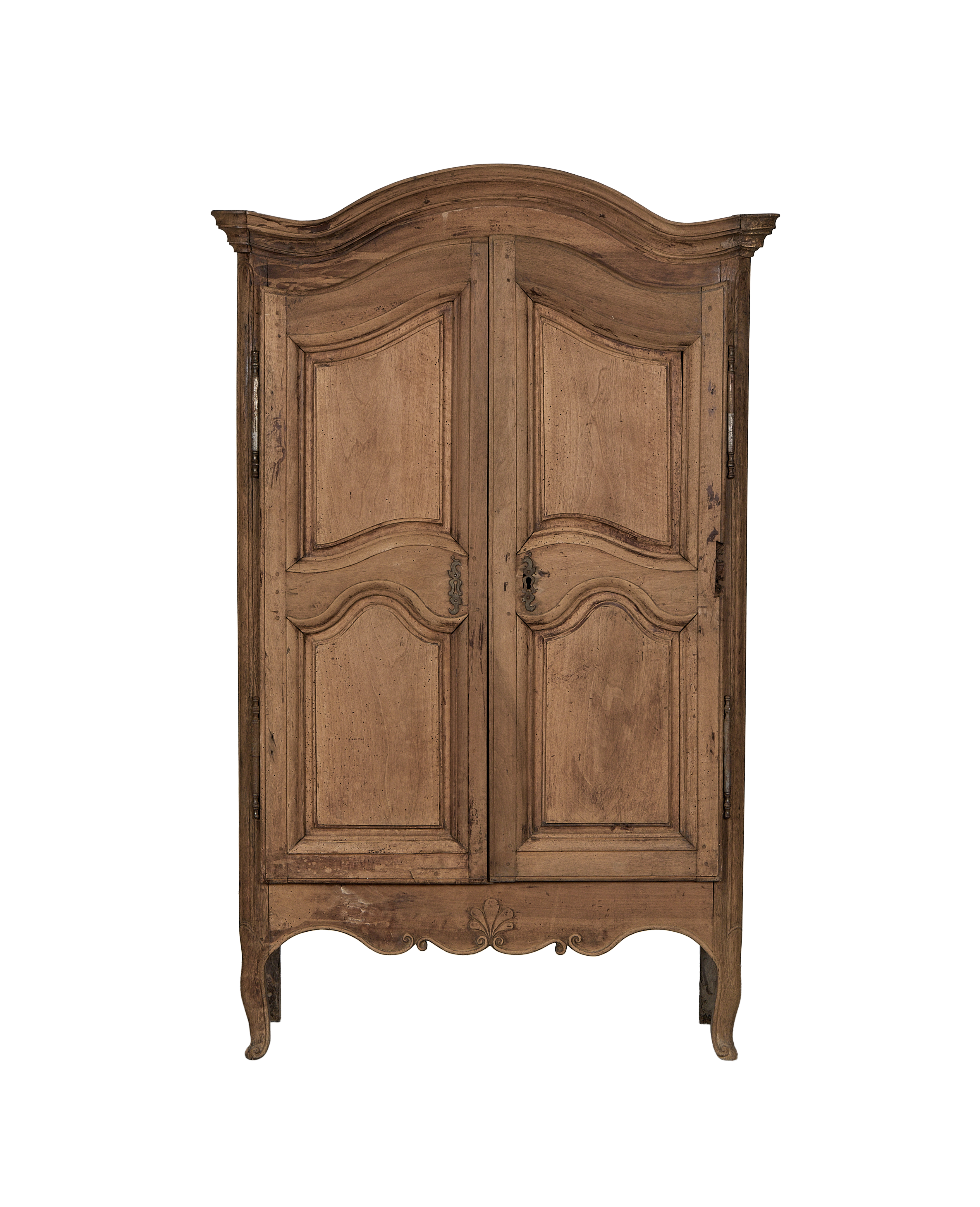 Vintage 18th-century French oak armoire, classic wavy top and paneled doors, distressed patina.