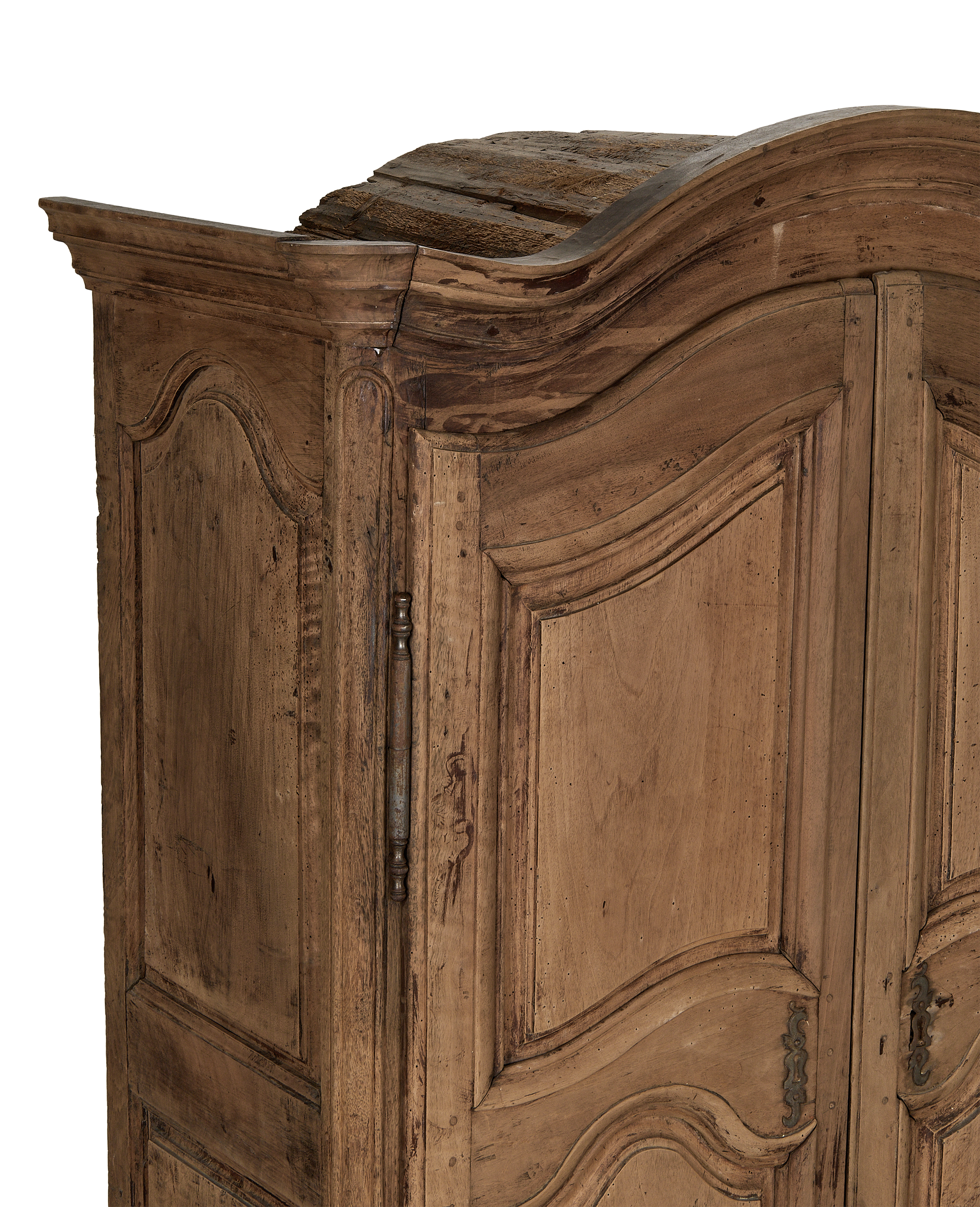 French 18th Century vintage oak armoire, showing distressed wood, curved top detail.