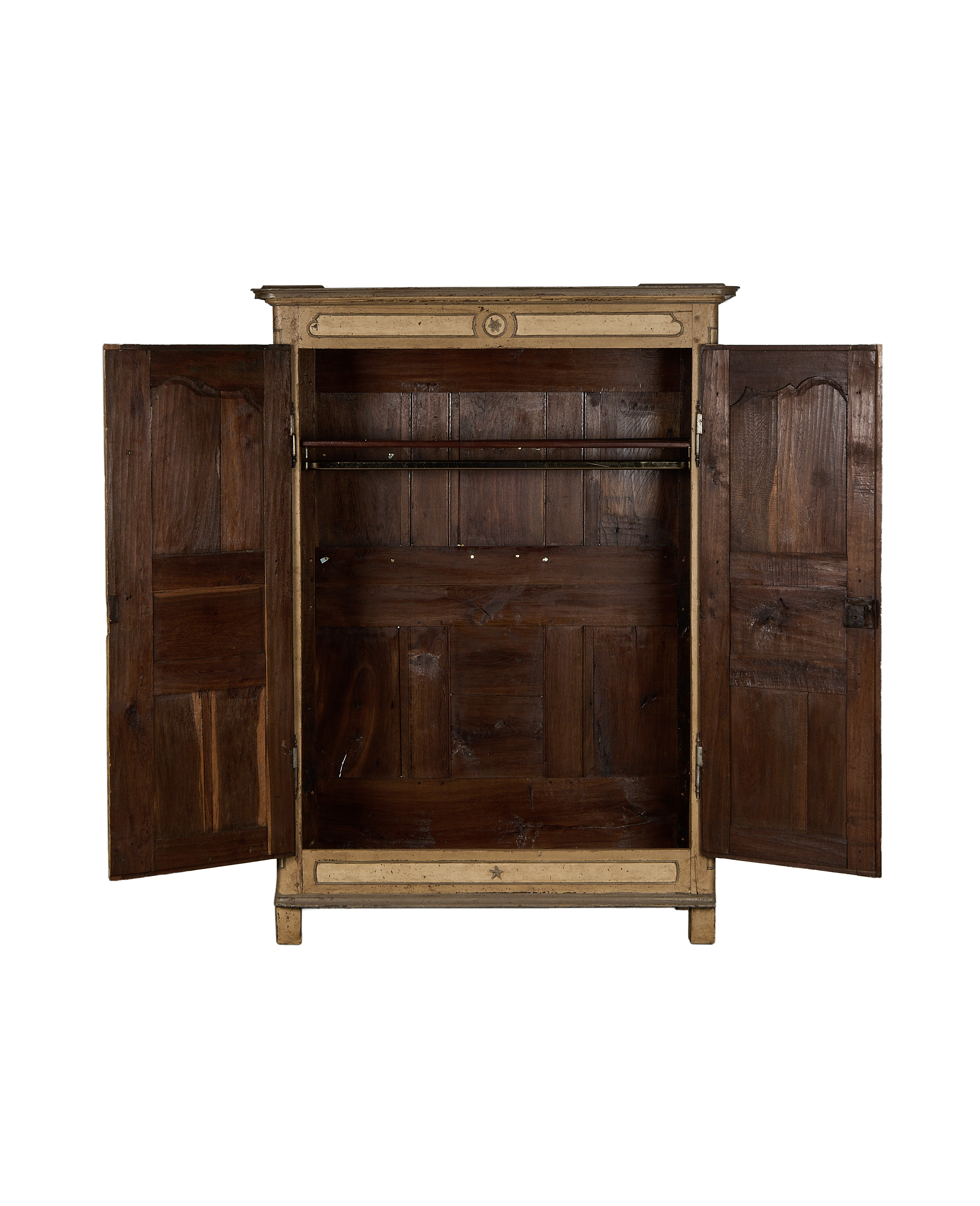 Vintage French oak armoire with open doors revealing spacious, distressed interior.