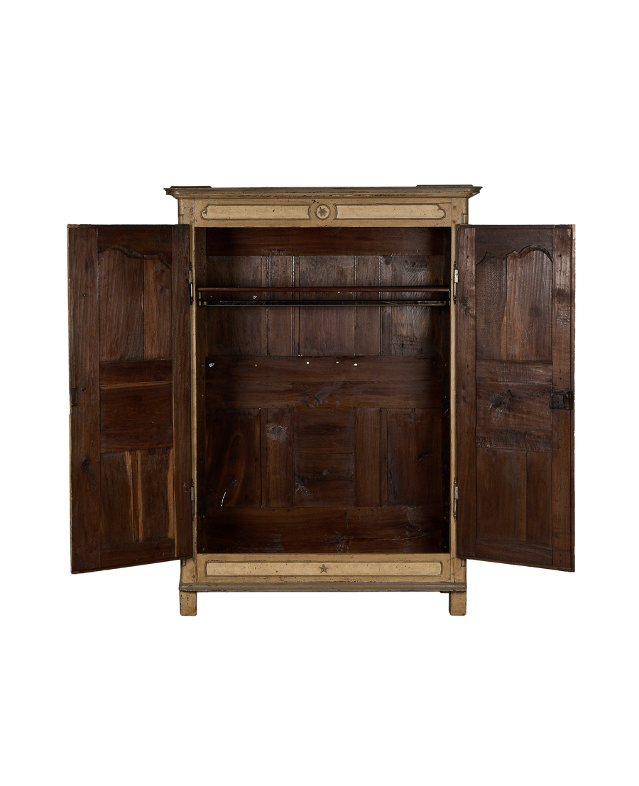 Vintage French oak armoire with open doors revealing spacious, distressed interior.