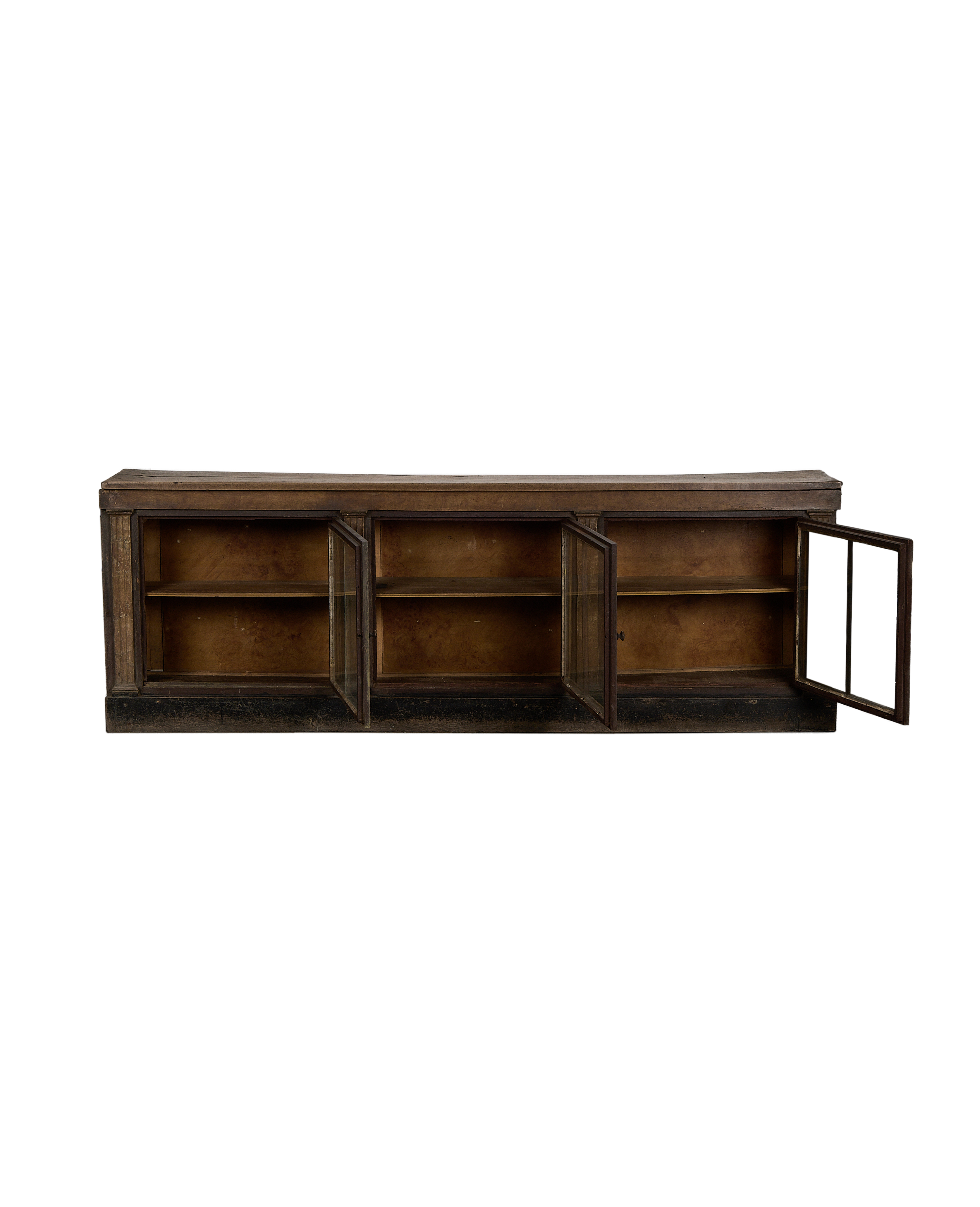 Vintage French oak sideboard, glass doors open, revealing interior shelves and aged wood.
