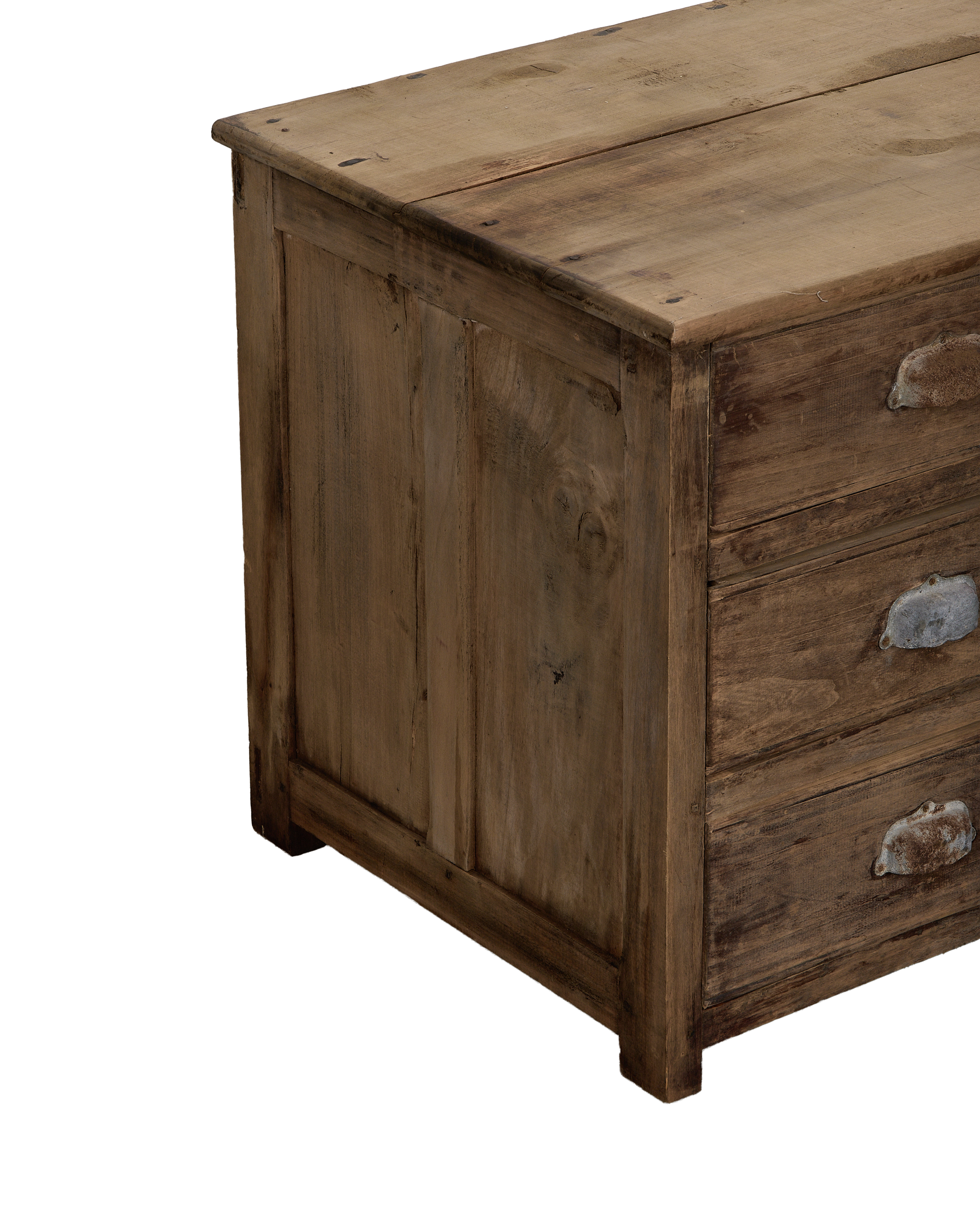 Vintage French oak drawer sideboard, angled detail of rustic wood grain, metal pulls.