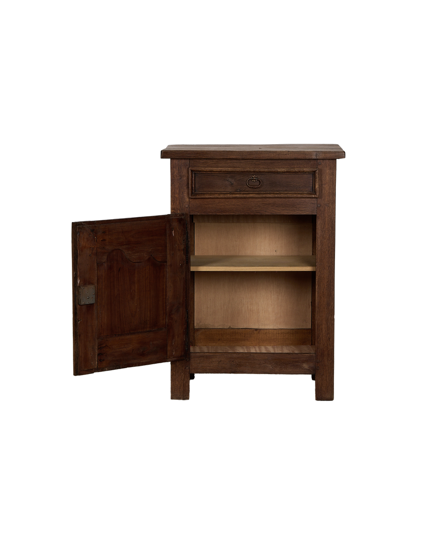 Vintage French oak cabinet with open door revealing interior shelf and drawer.