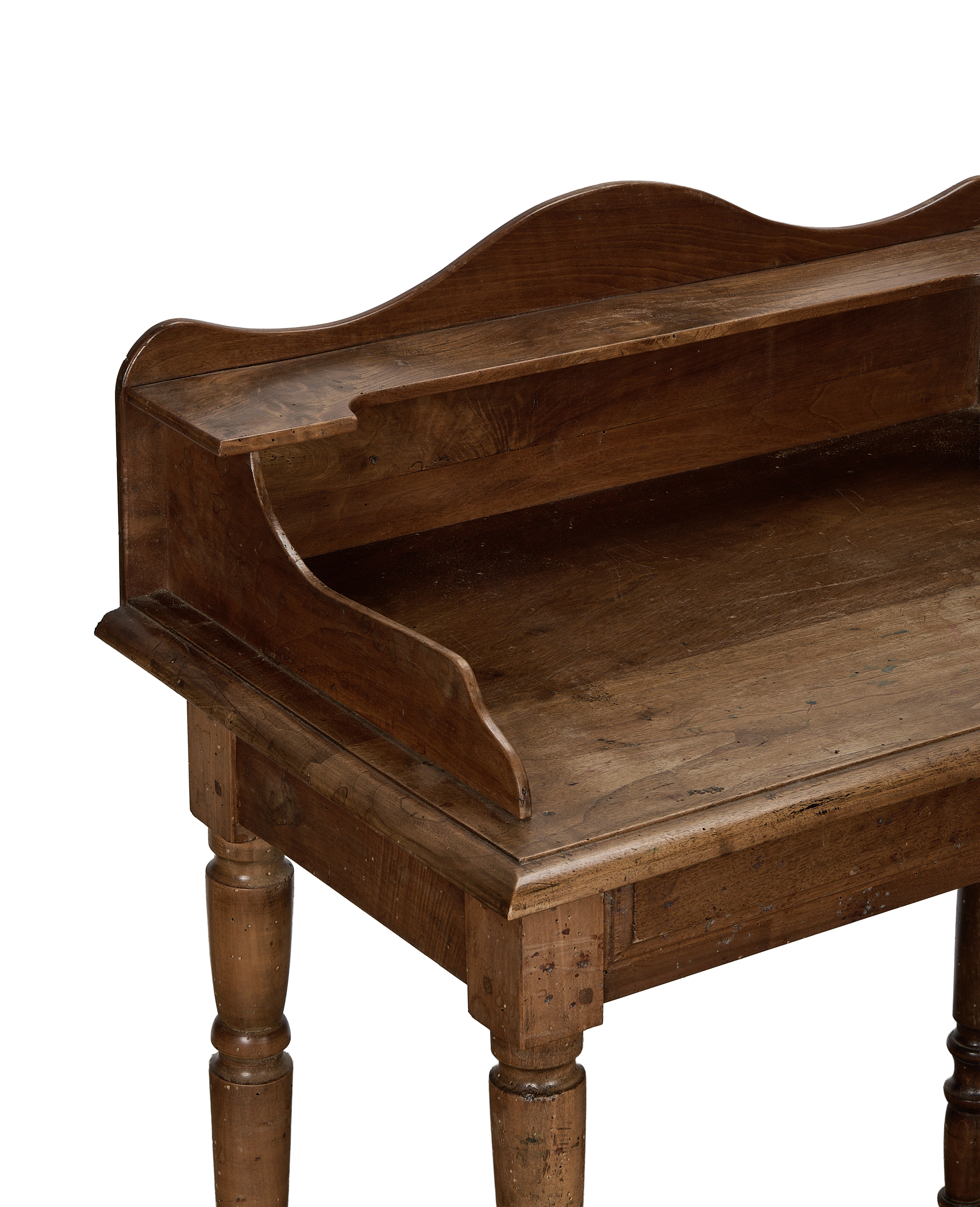 Vintage French oak desk, detail view of the curved front hutch and turned legs.