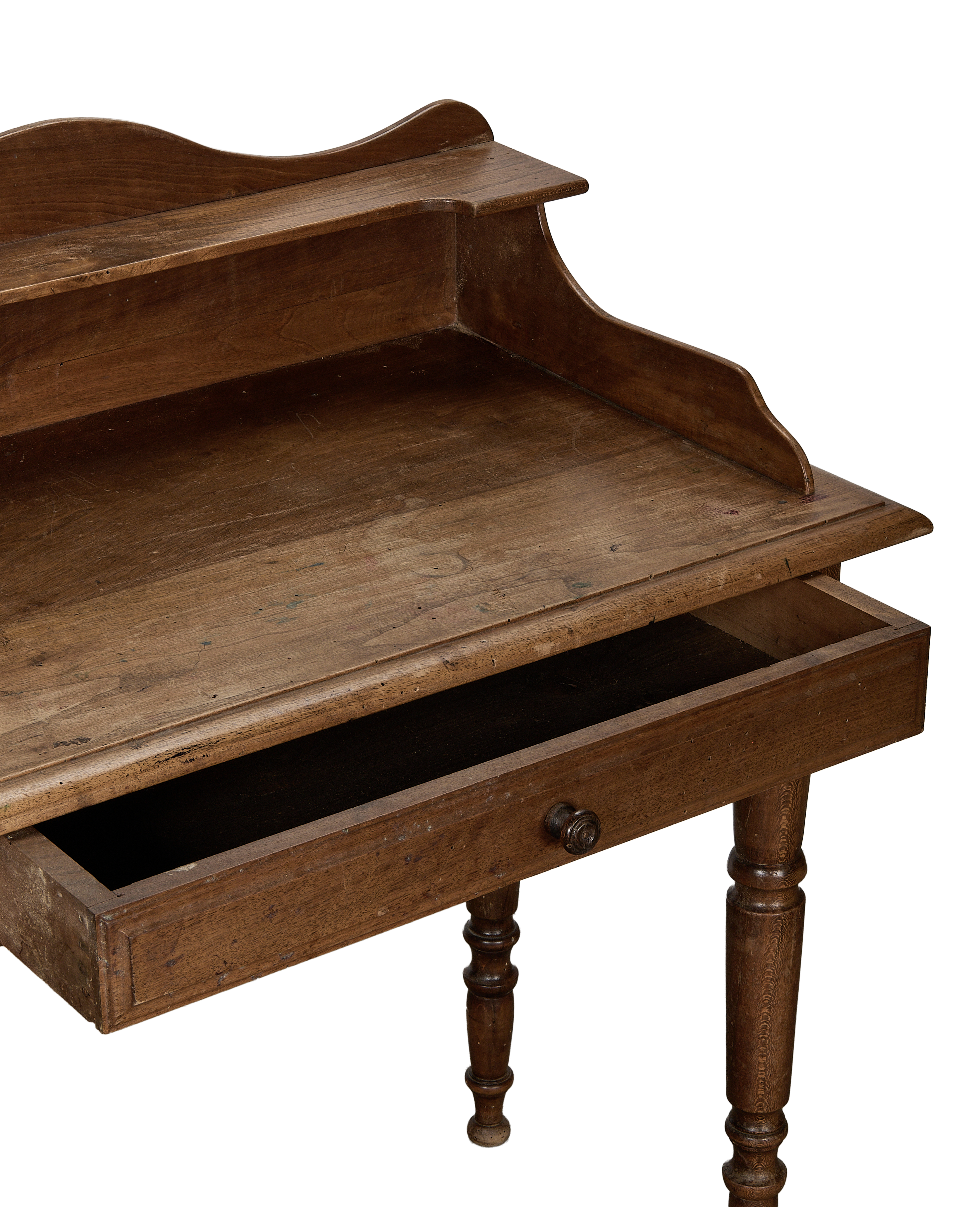 Vintage French oak desk, open drawer revealing interior, turned leg detail.