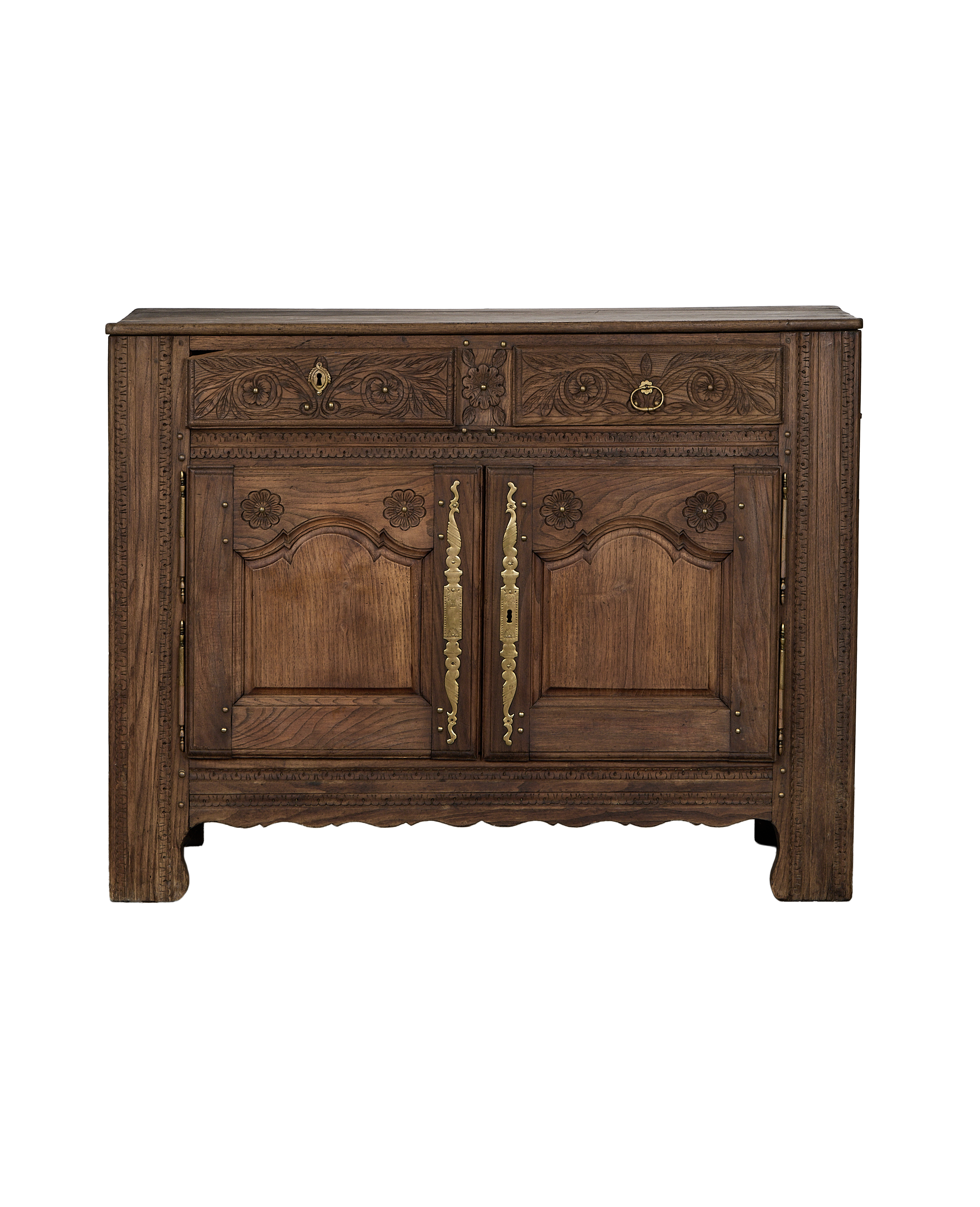 Vintage French oak sideboard featuring carved floral panels, two drawers, and brass hardware.