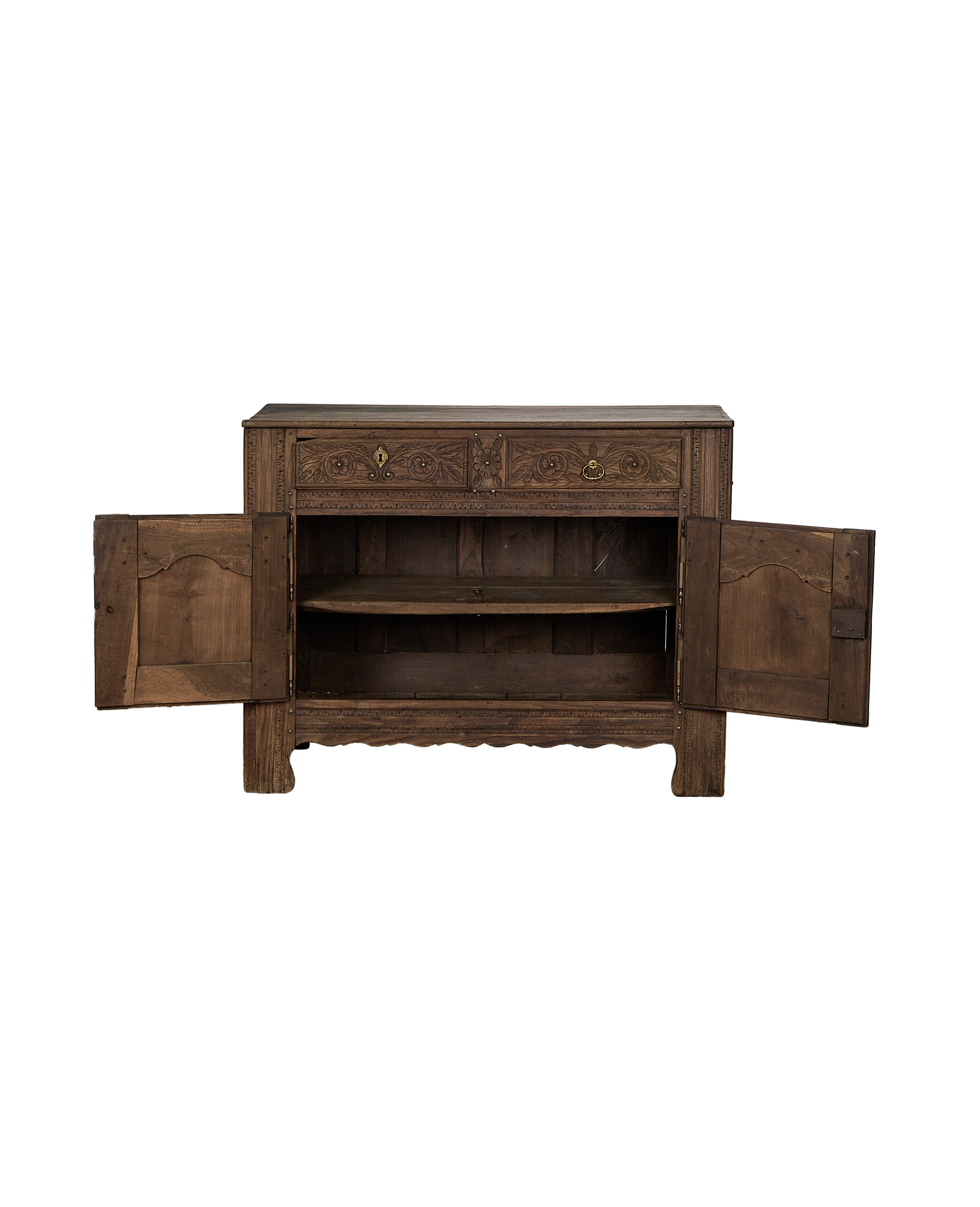 Vintage French carved oak sideboard with open doors revealing interior shelves.