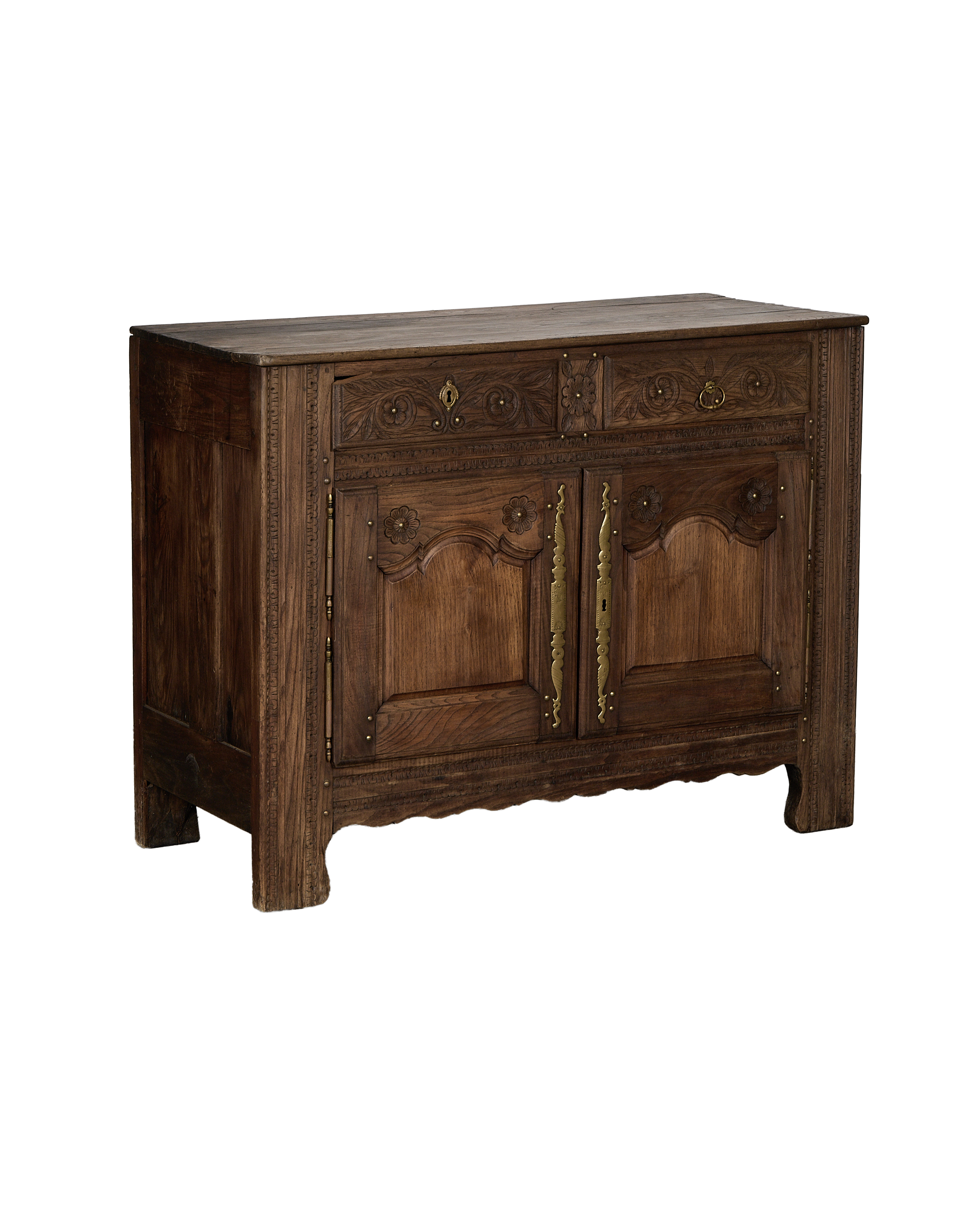 Vintage French oak sideboard; detailed view of carved floral patterns and brass hardware.