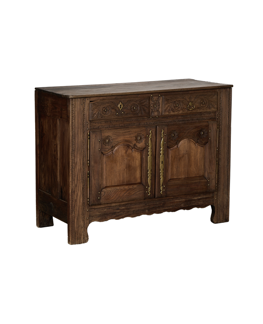 Vintage French oak sideboard; detailed view of carved floral patterns and brass hardware.
