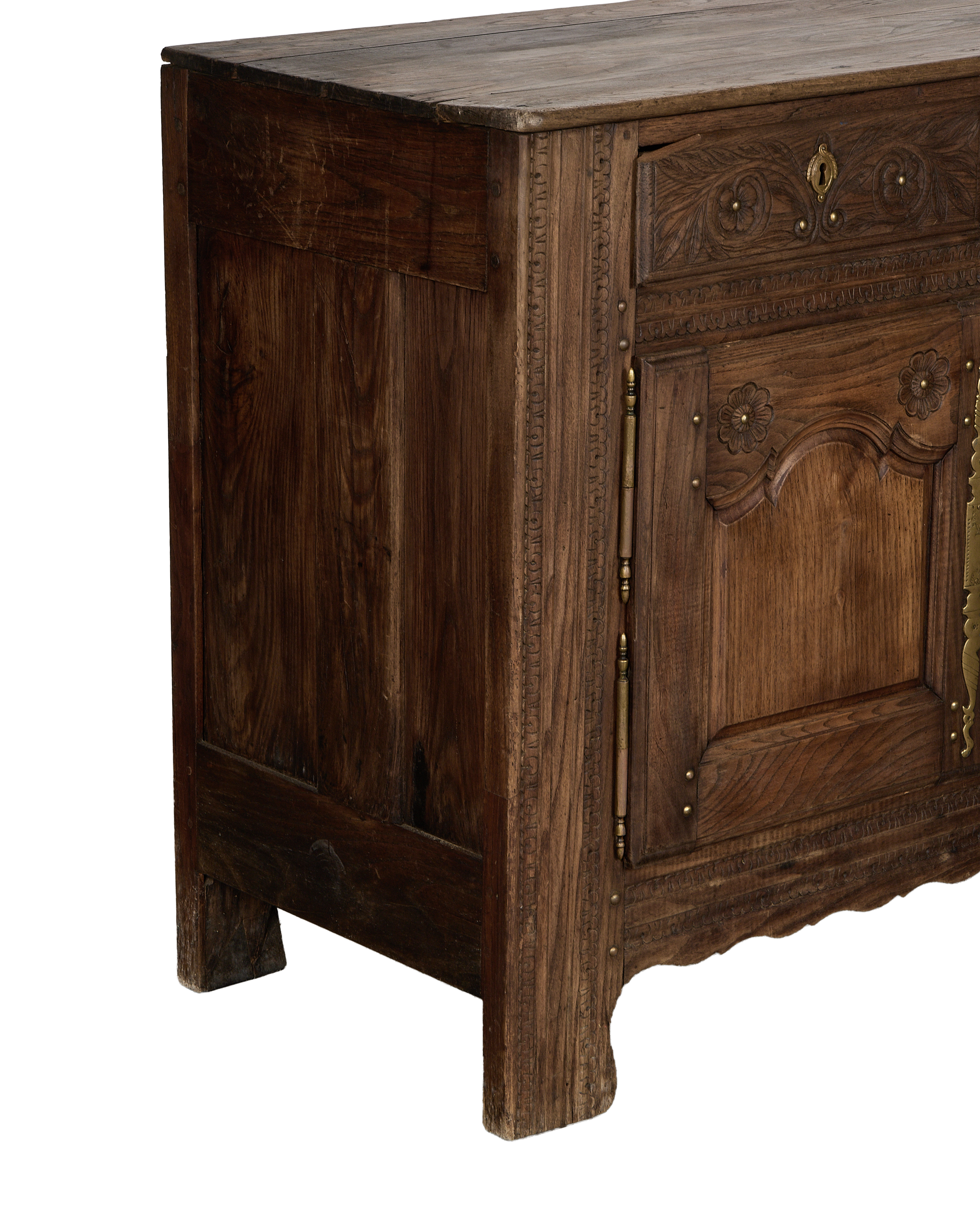 Vintage French oak sideboard, showing intricate carved floral and leaf details on drawer.