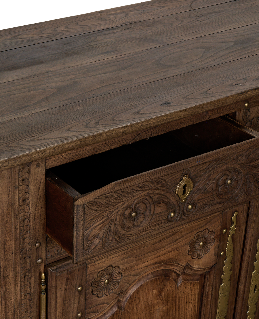Vintage French oak sideboard, detail of open drawer revealing ornate brass keyhole.