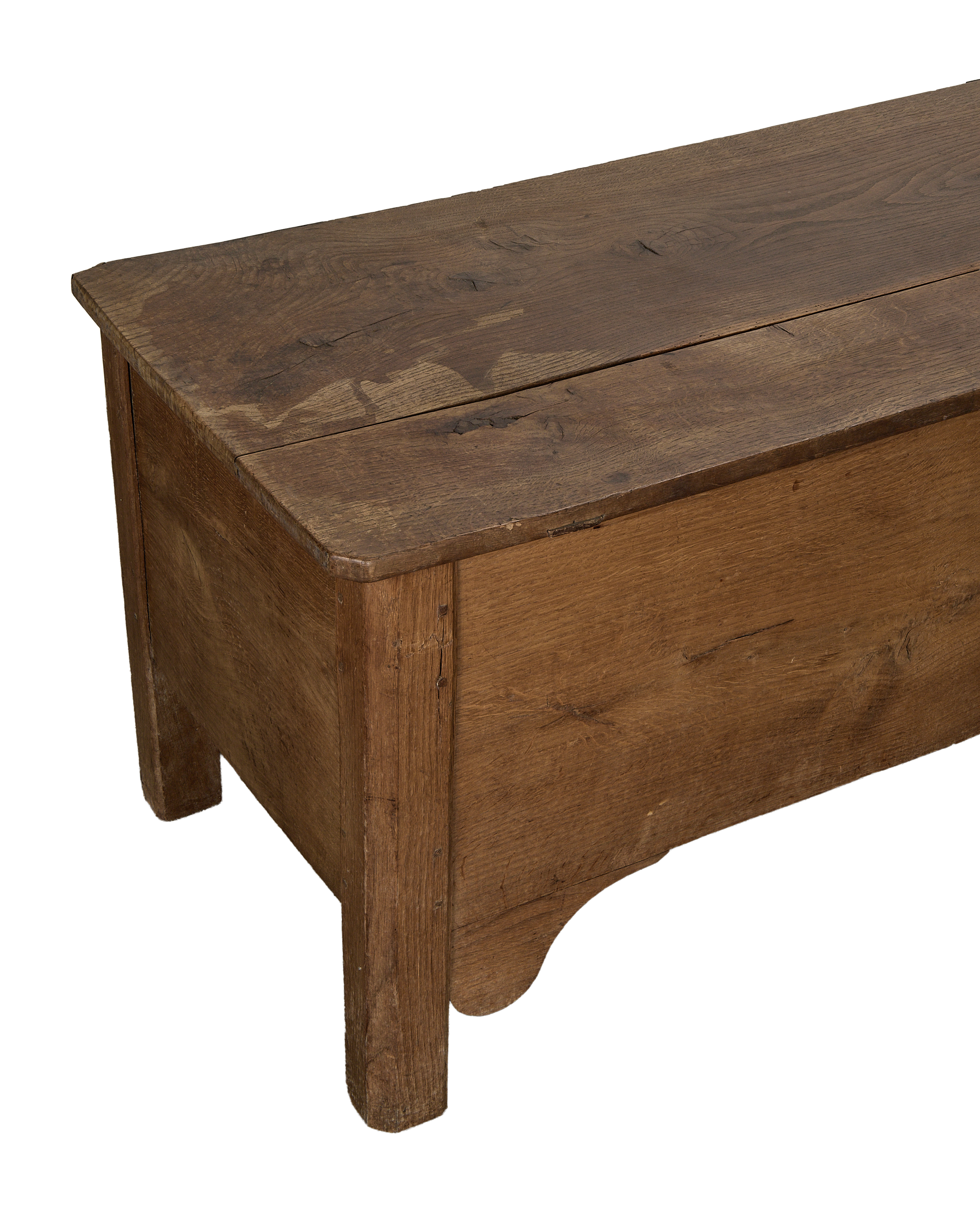 Vintage French oak storage trunk, unique side detailing, aged rustic wood finish.