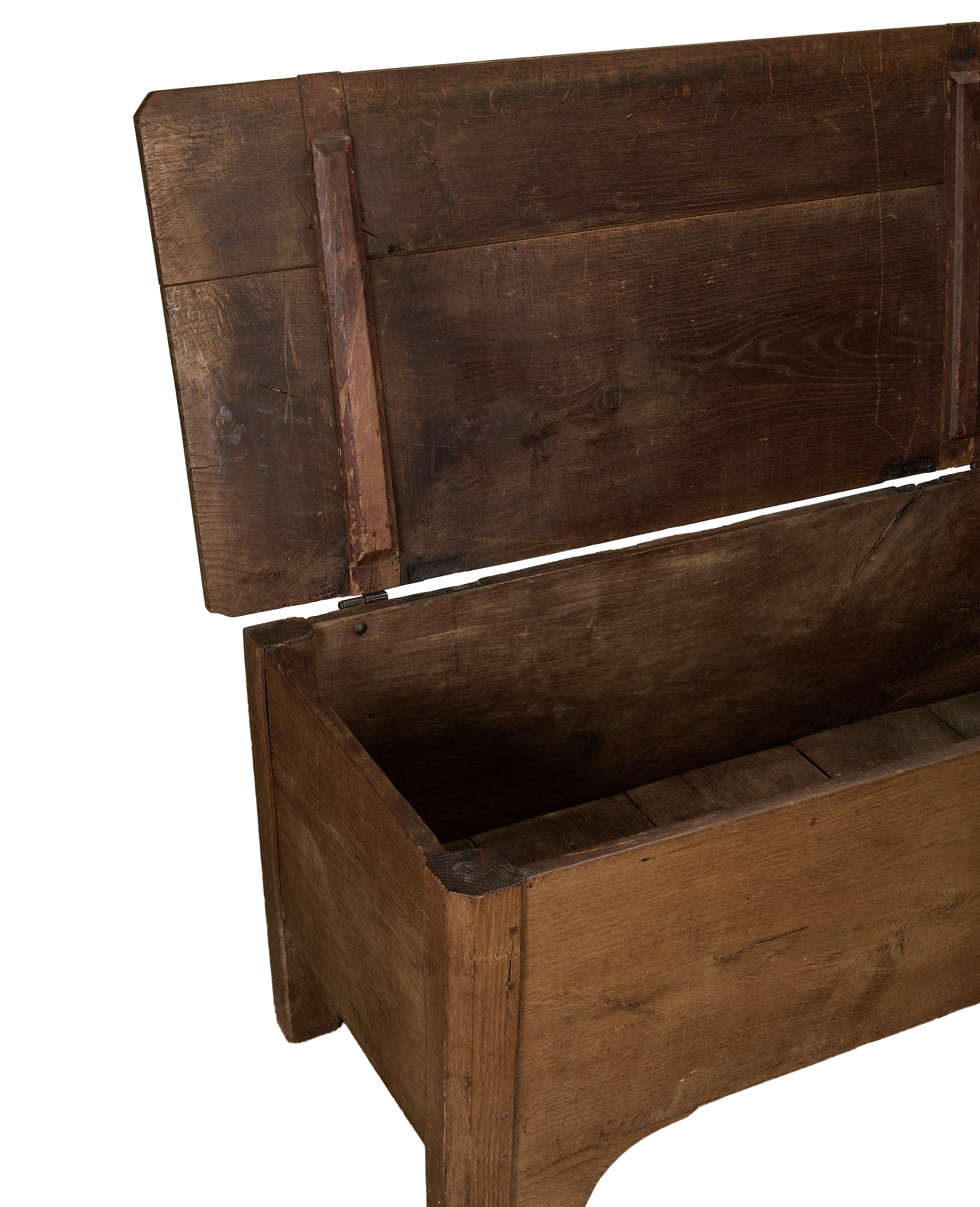 Vintage French oak storage trunk, interior view with open lid showing antique wood grain.