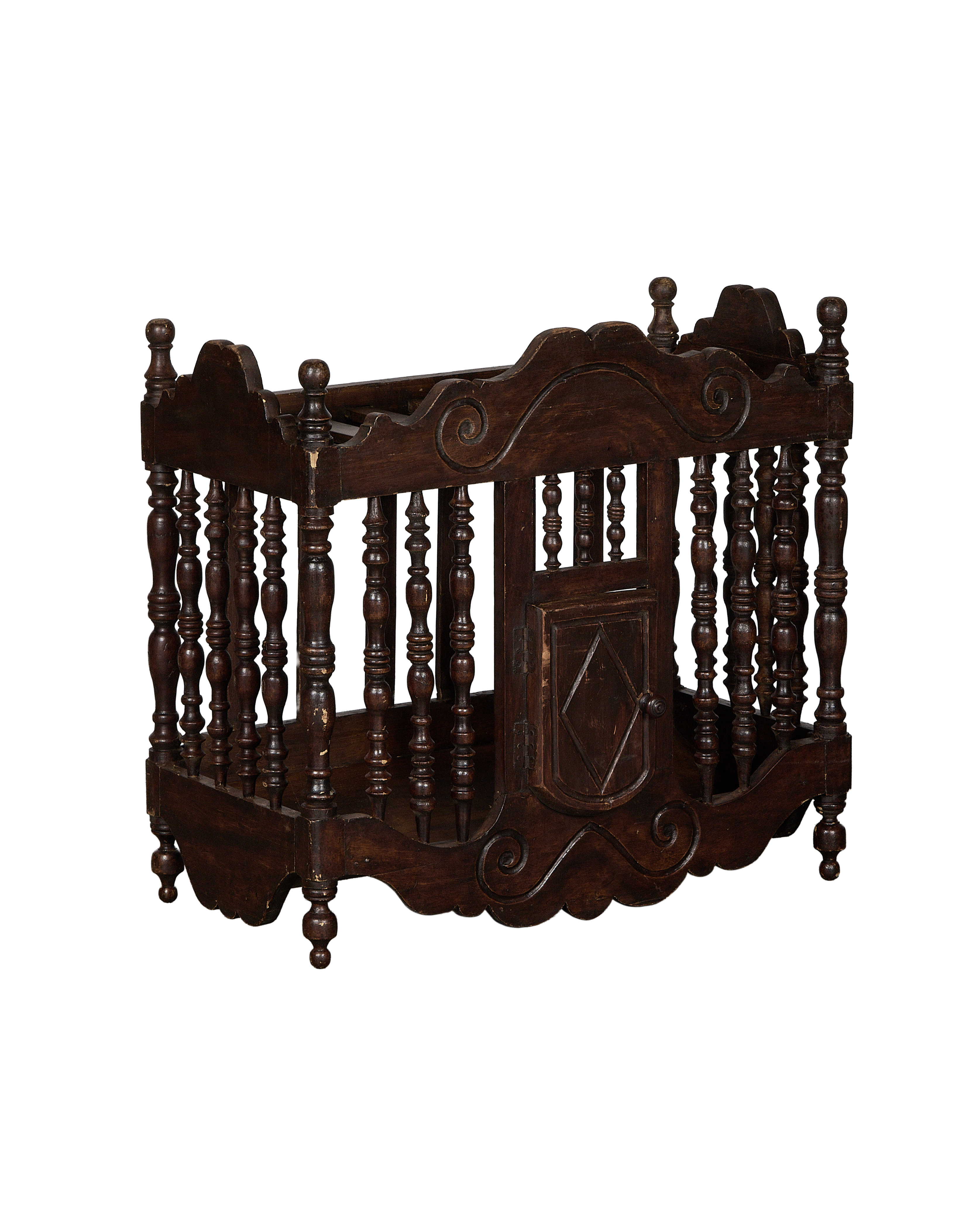 Vintage French oak bread cabinet, dark patinated wood, ornate carved scrolling details and balusters.