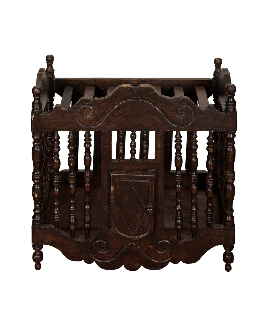 Vintage French oak bread cabinet, showing the carved wooden balusters and ornate door detail.