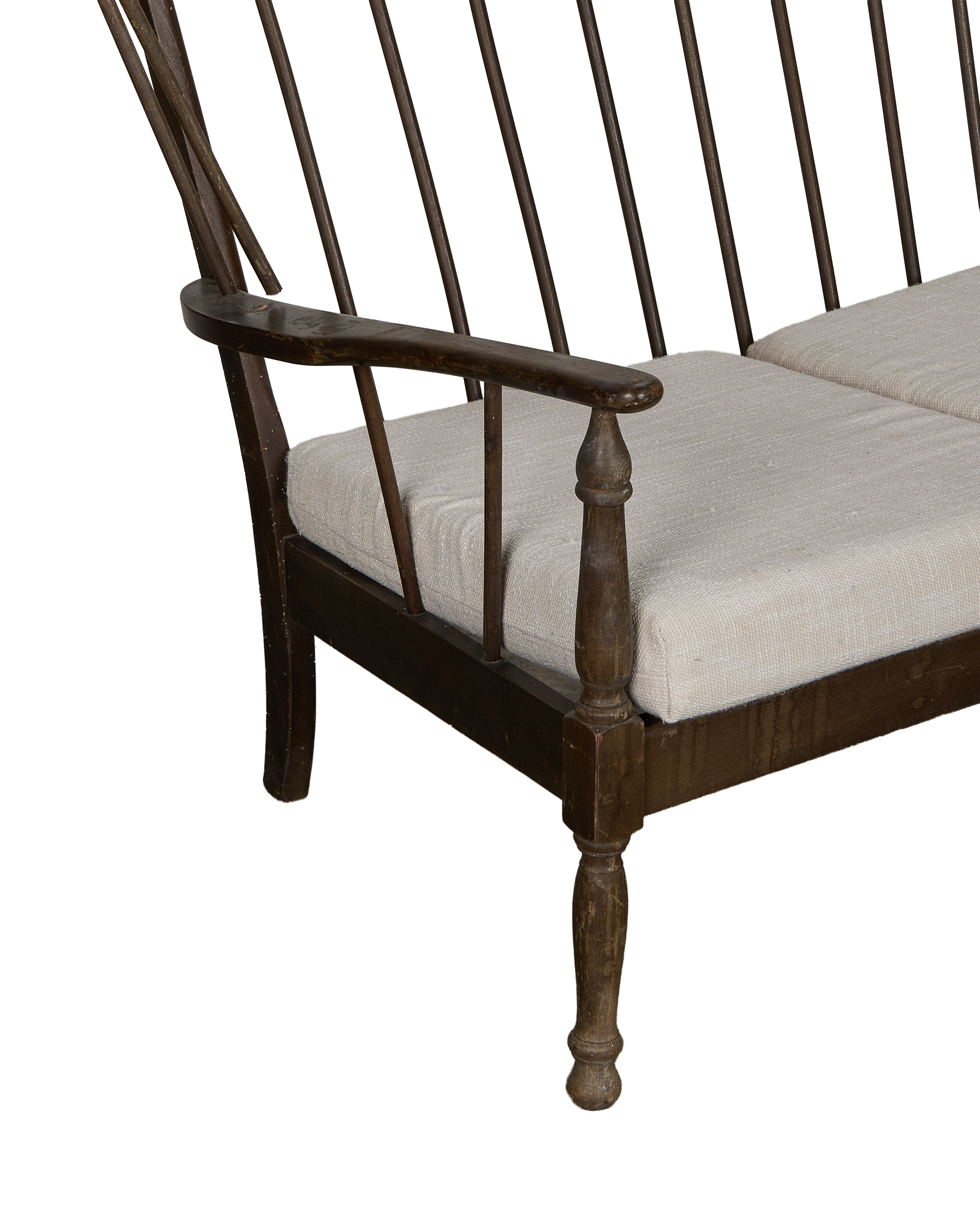 Vintage French Oak lounge bench showcasing detailed spindle back and turned wood armrest.