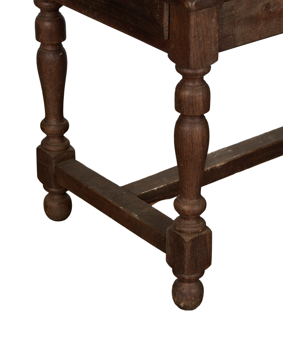 Vintage French oak draper's table leg with turned details, showcasing aged patina.