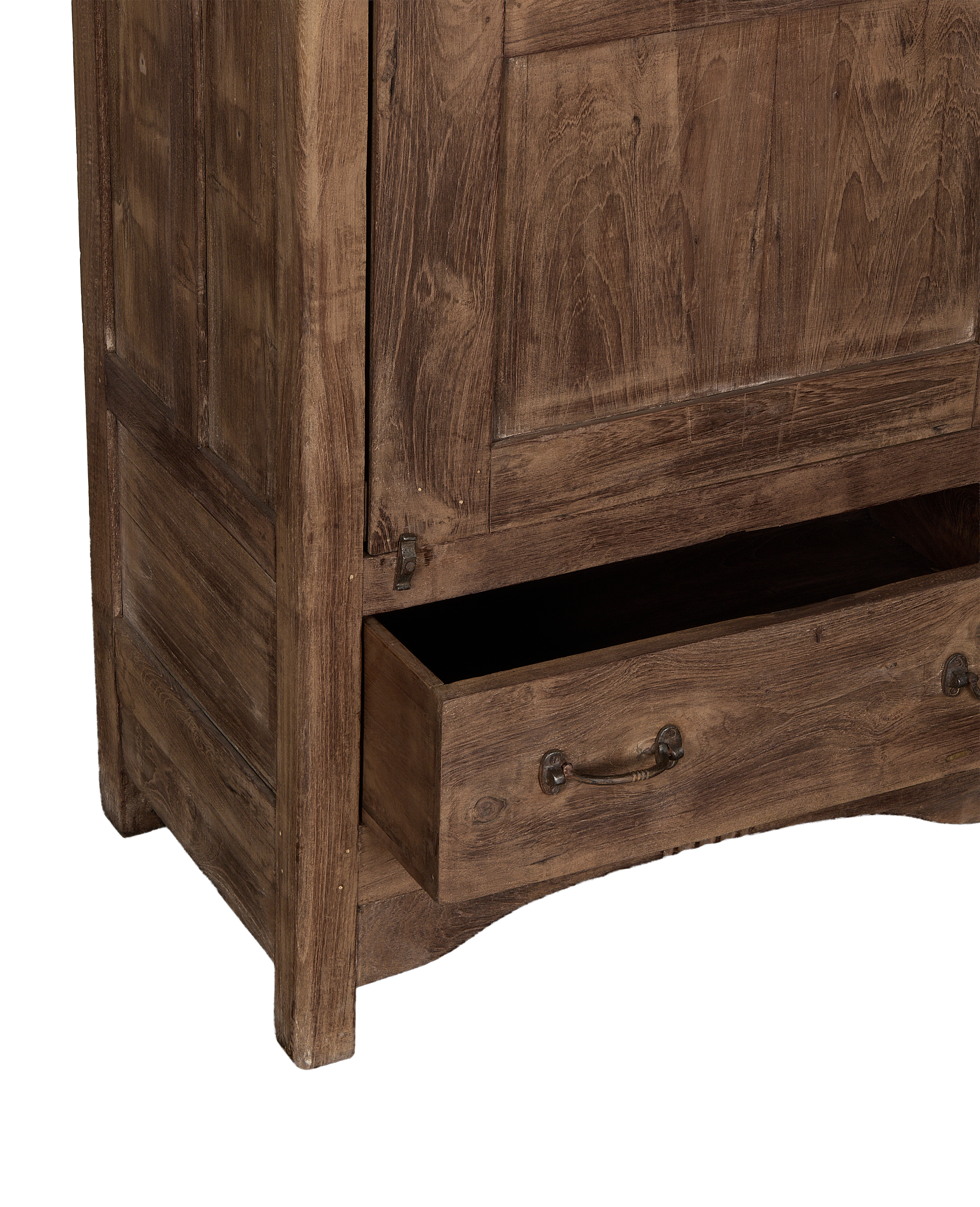 Vintage Indian oak cabinet: lower drawer with decorative metal pull, natural wood grain.