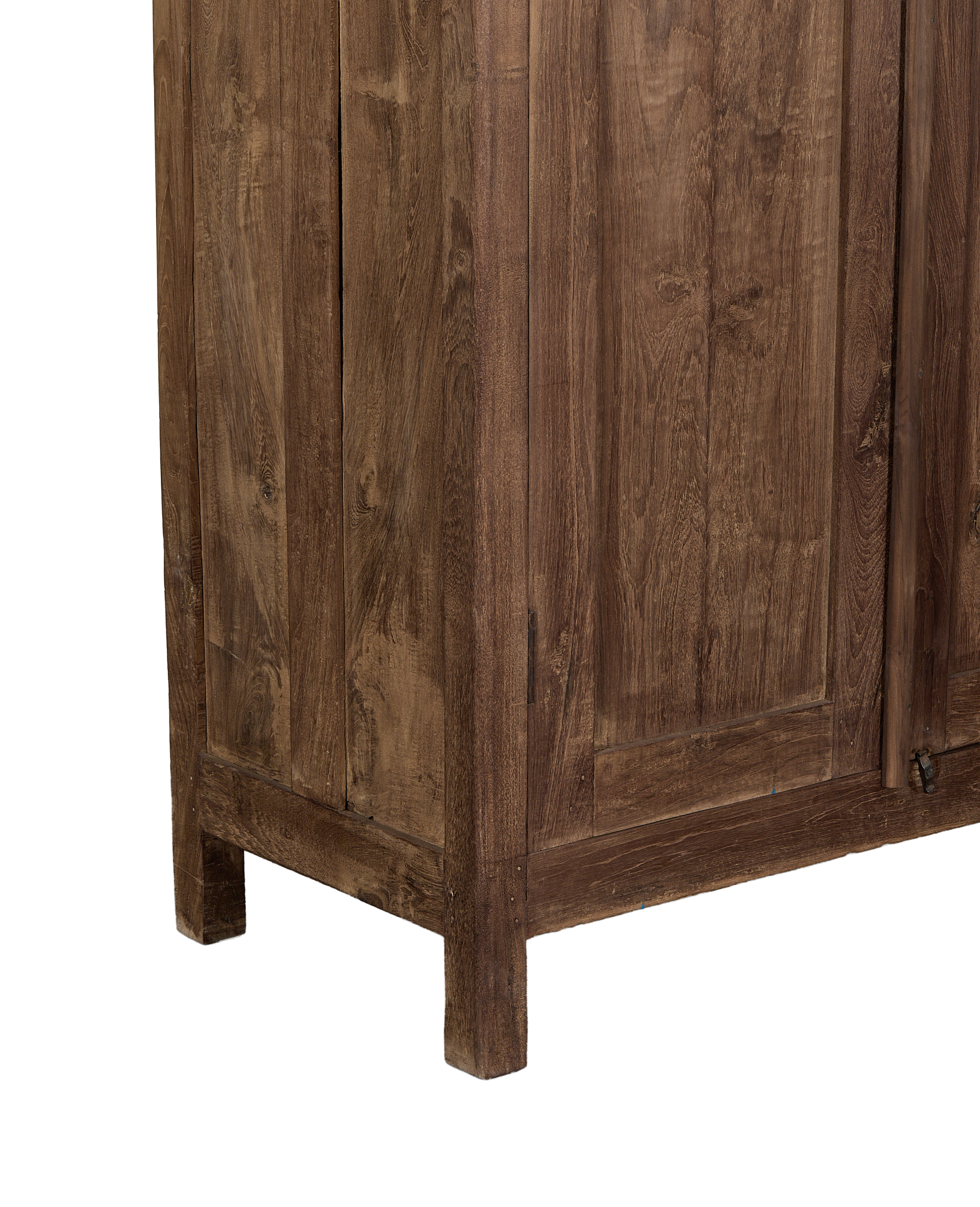 Close-up of the vintage Indian oak wood cabinet's natural grain and sturdy legs.