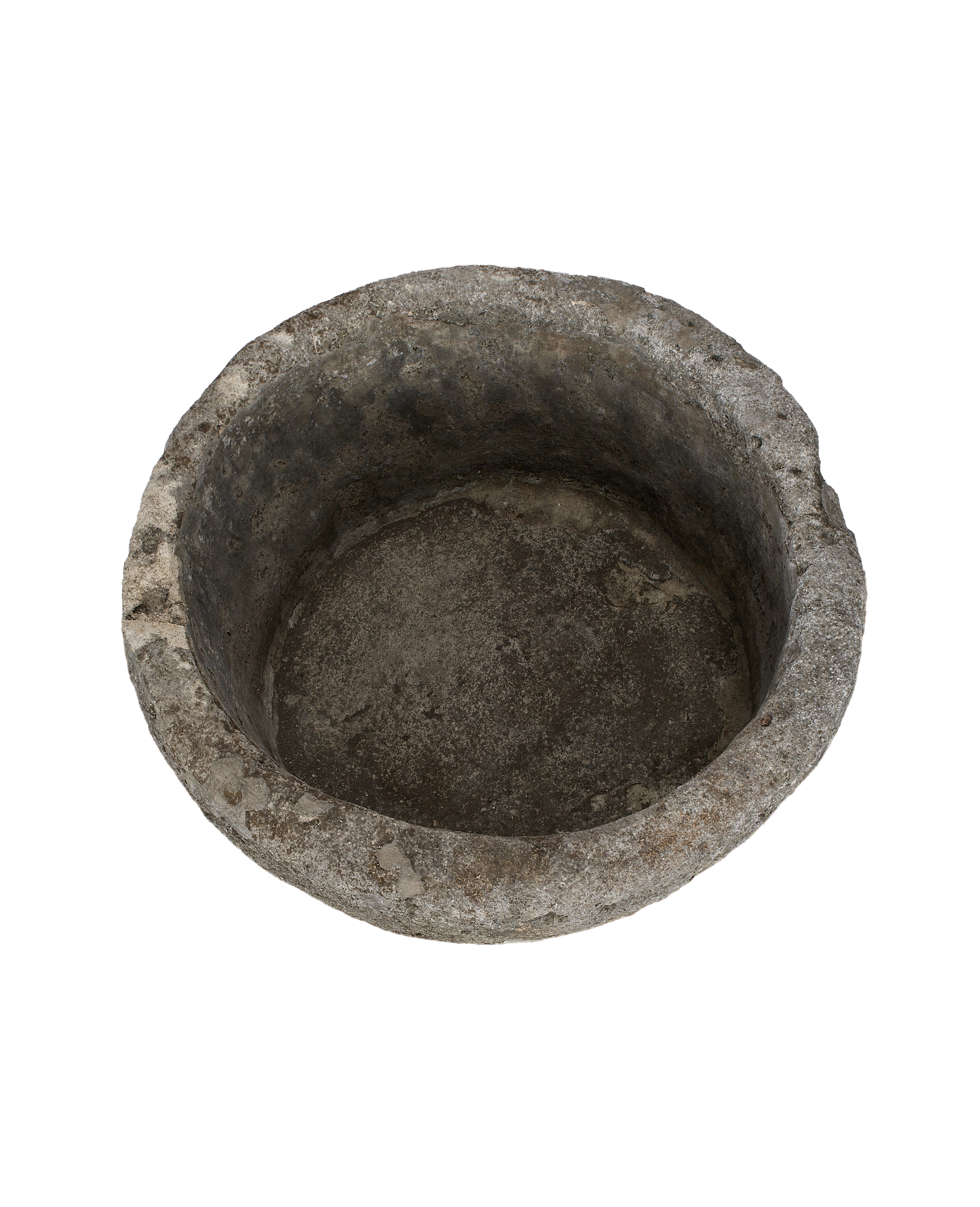 Vintage Indonesian round limestone trough, top view showcasing aged interior texture.