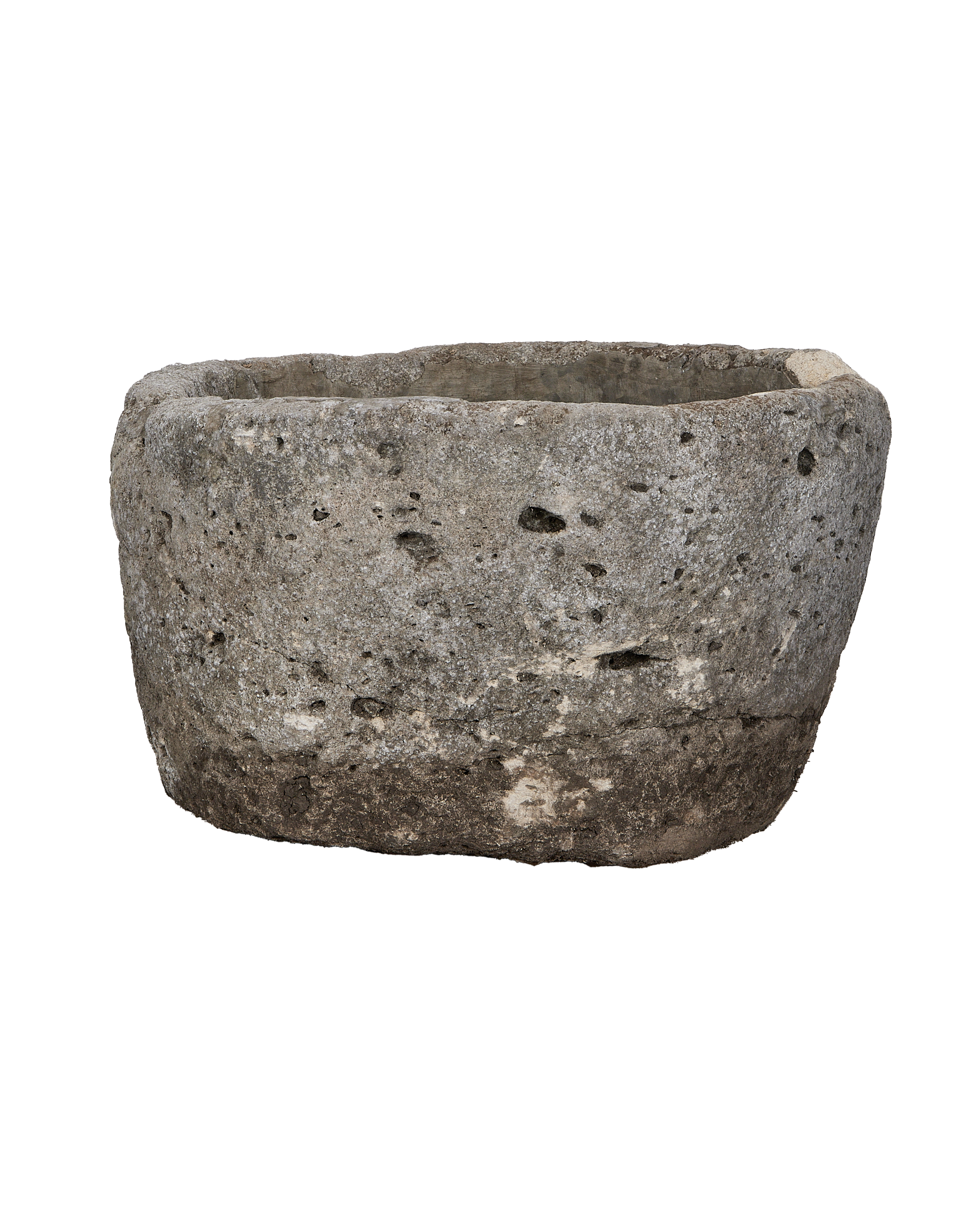 Vintage Indonesian limestone trough, round, showing weathered gray-brown exterior texture and uneven rim.