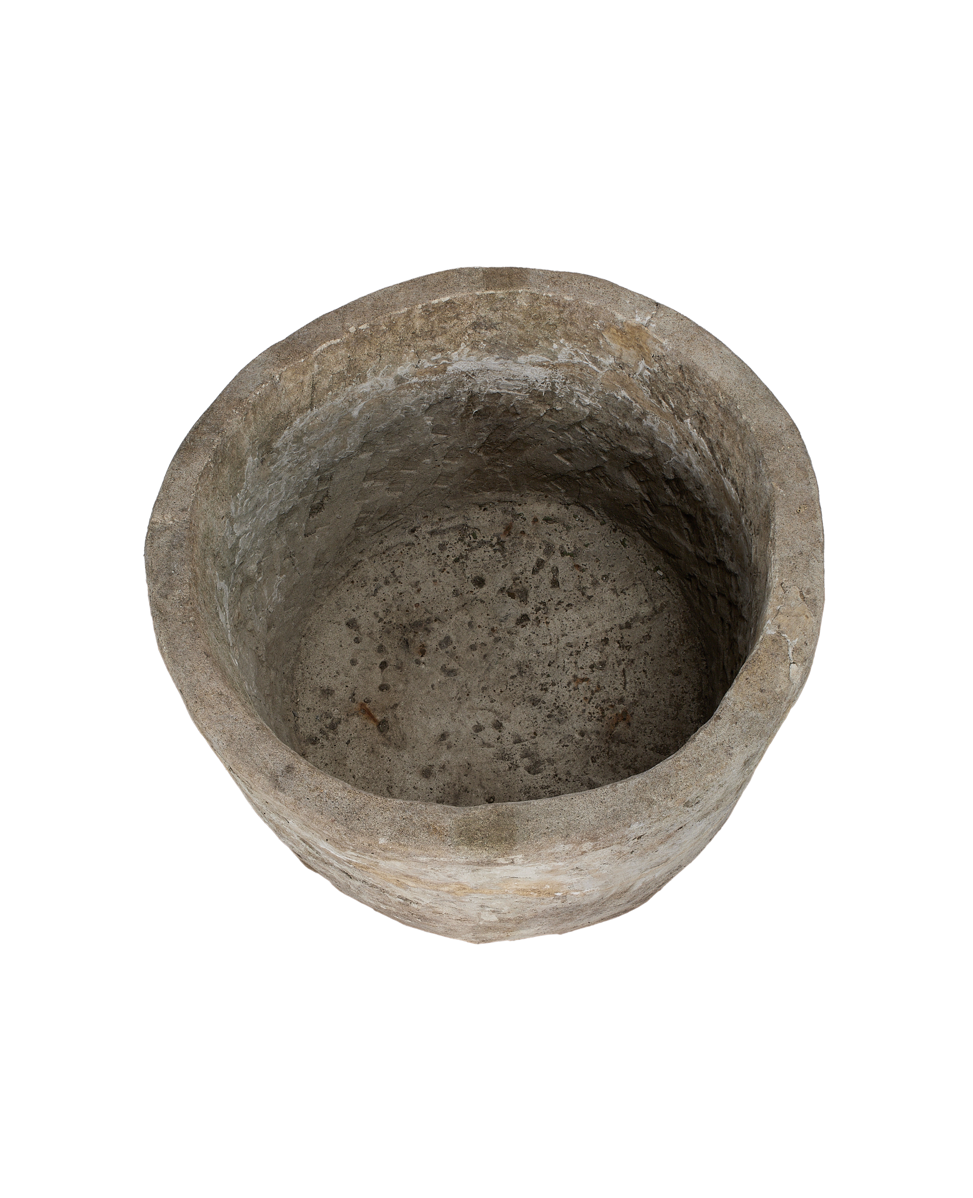 Vintage round Indonesian limestone trough, top-down view showing interior texture.