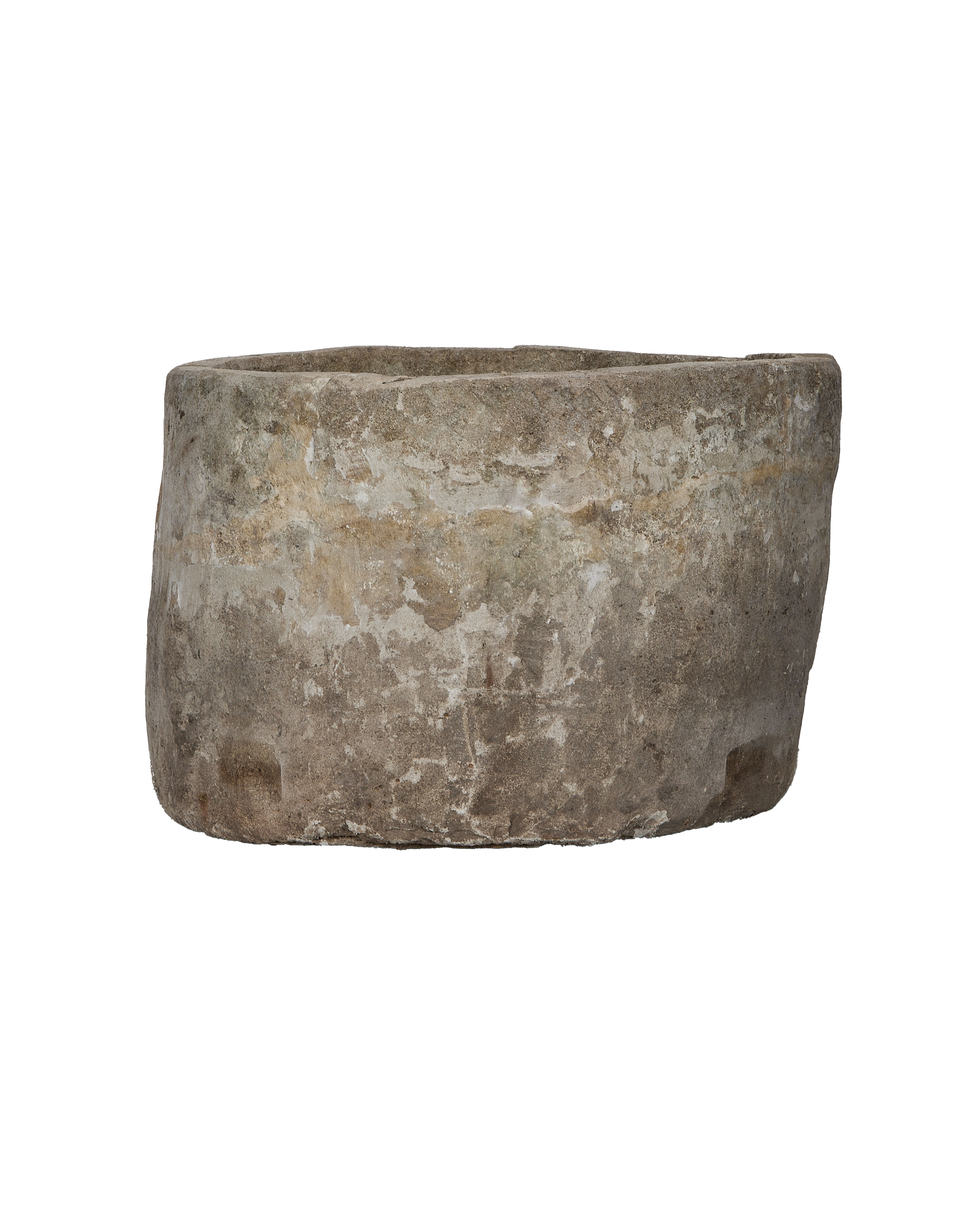 Vintage Indonesian round limestone trough, showing weathered texture and age with side view.
