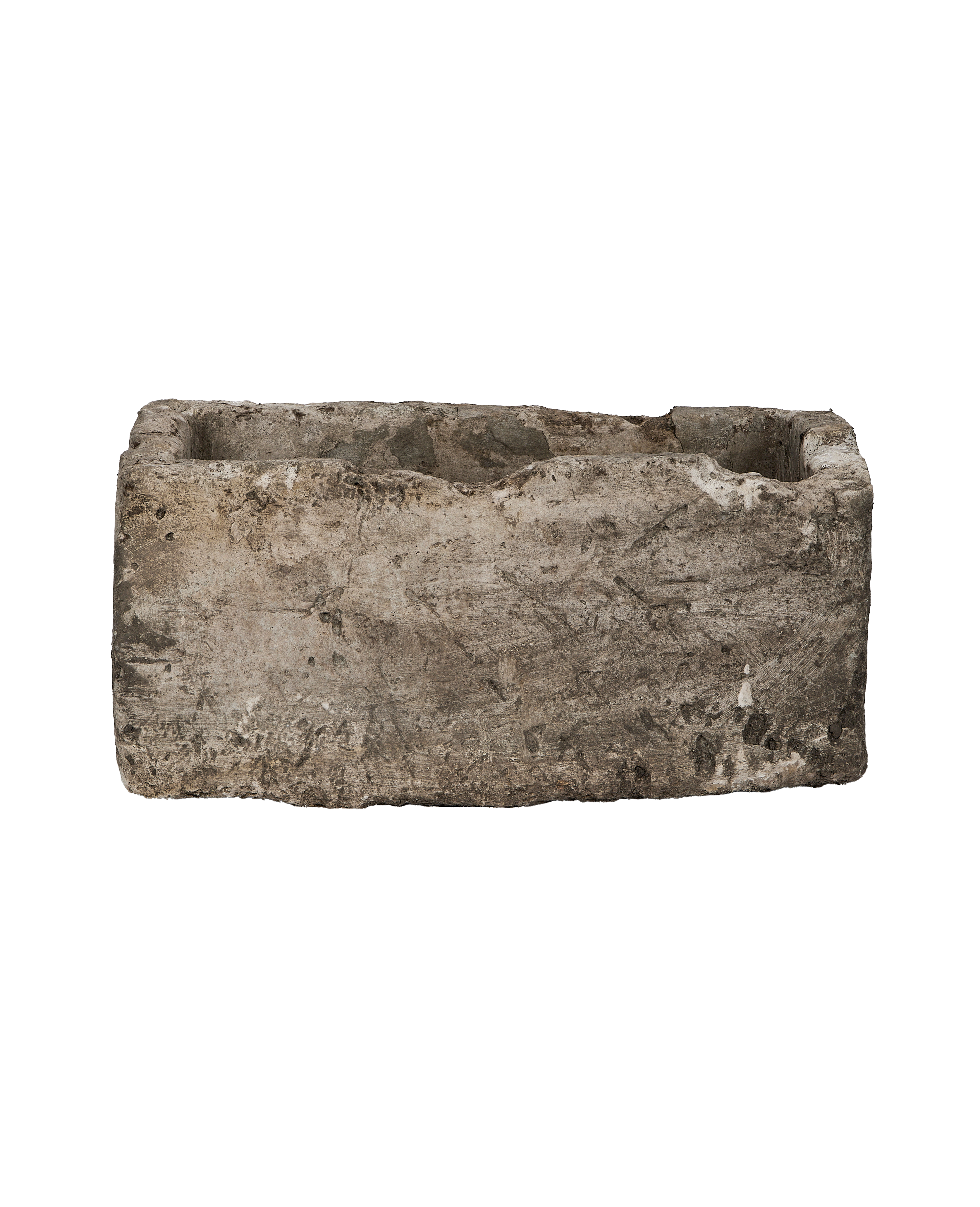 Vintage rectangular limestone trough, showing rough exterior with textured surface and weathered patina.