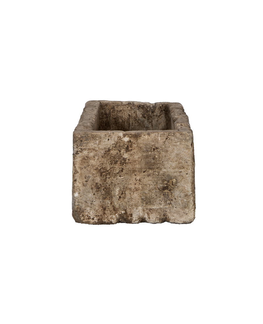 Limestone trough, rectangular vintage Indonesian OAK, showing rough weathered exterior texture.