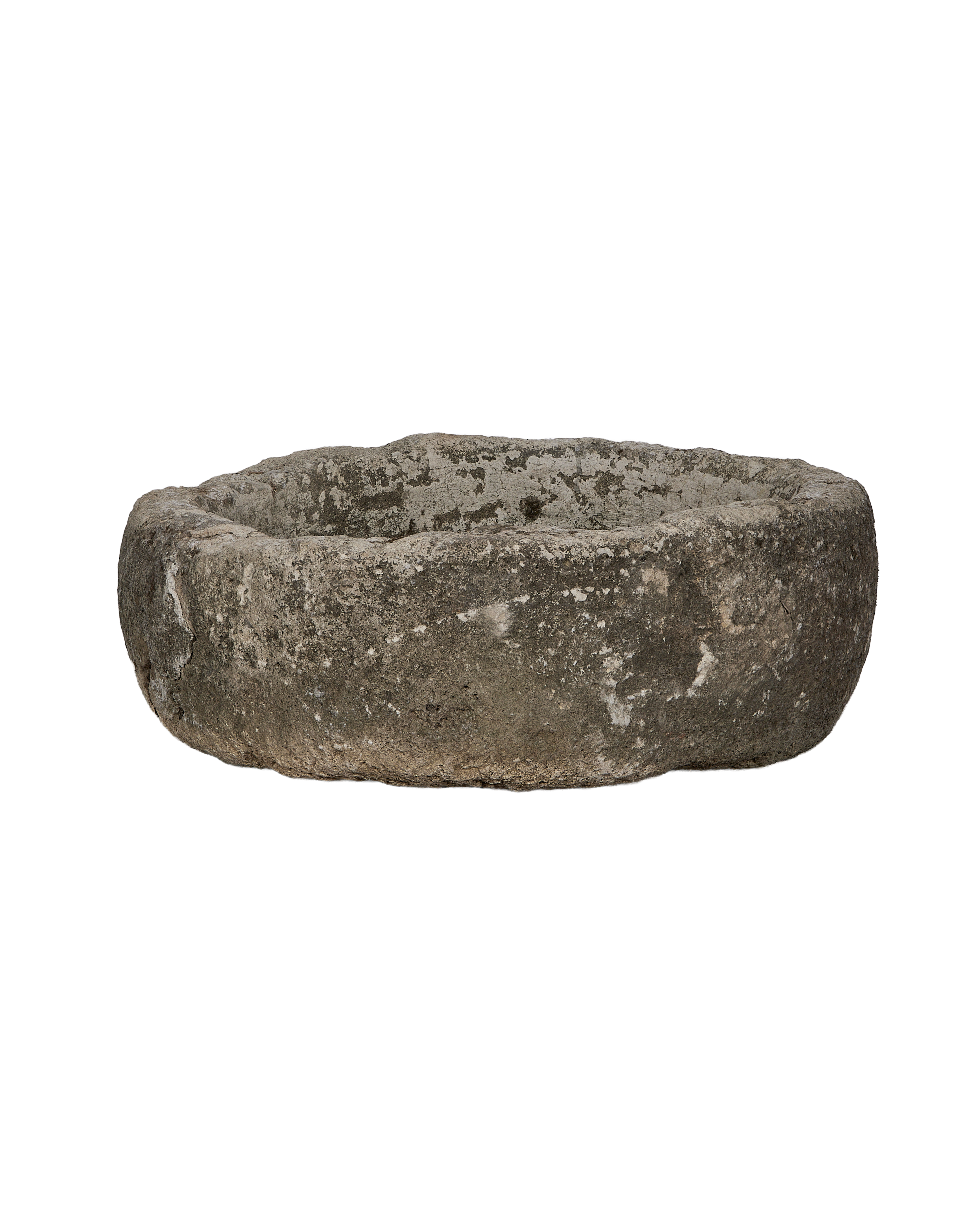 Vintage Indonesian limestone trough, round shape, aged textured gray stone.