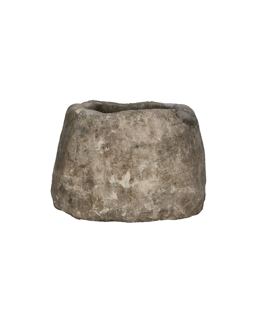 Vintage Indonesian oblong limestone trough, showing a different angle of its weathered, textured surface.