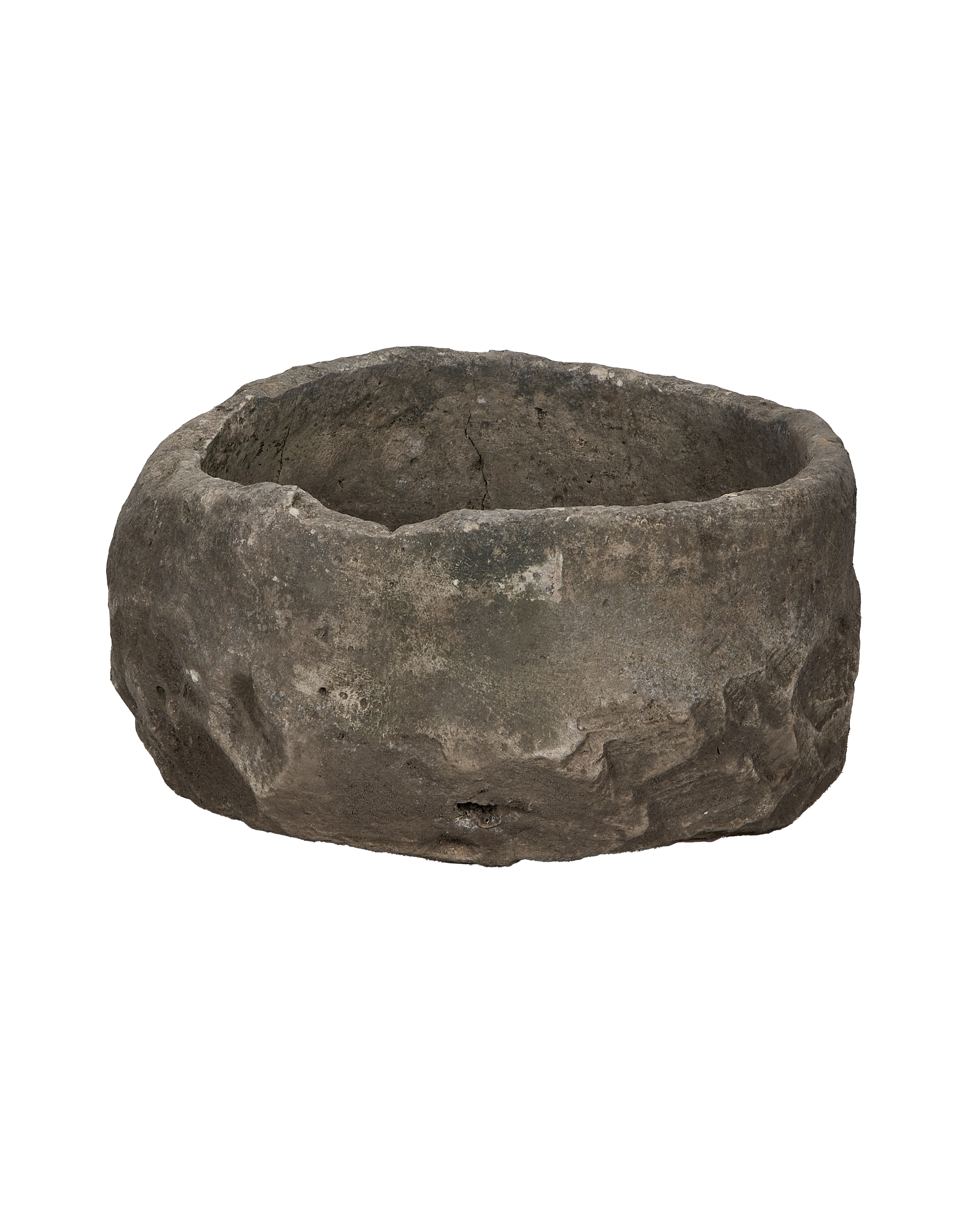 Vintage Indonesian round limestone trough, rough textured, weathered grey finish.