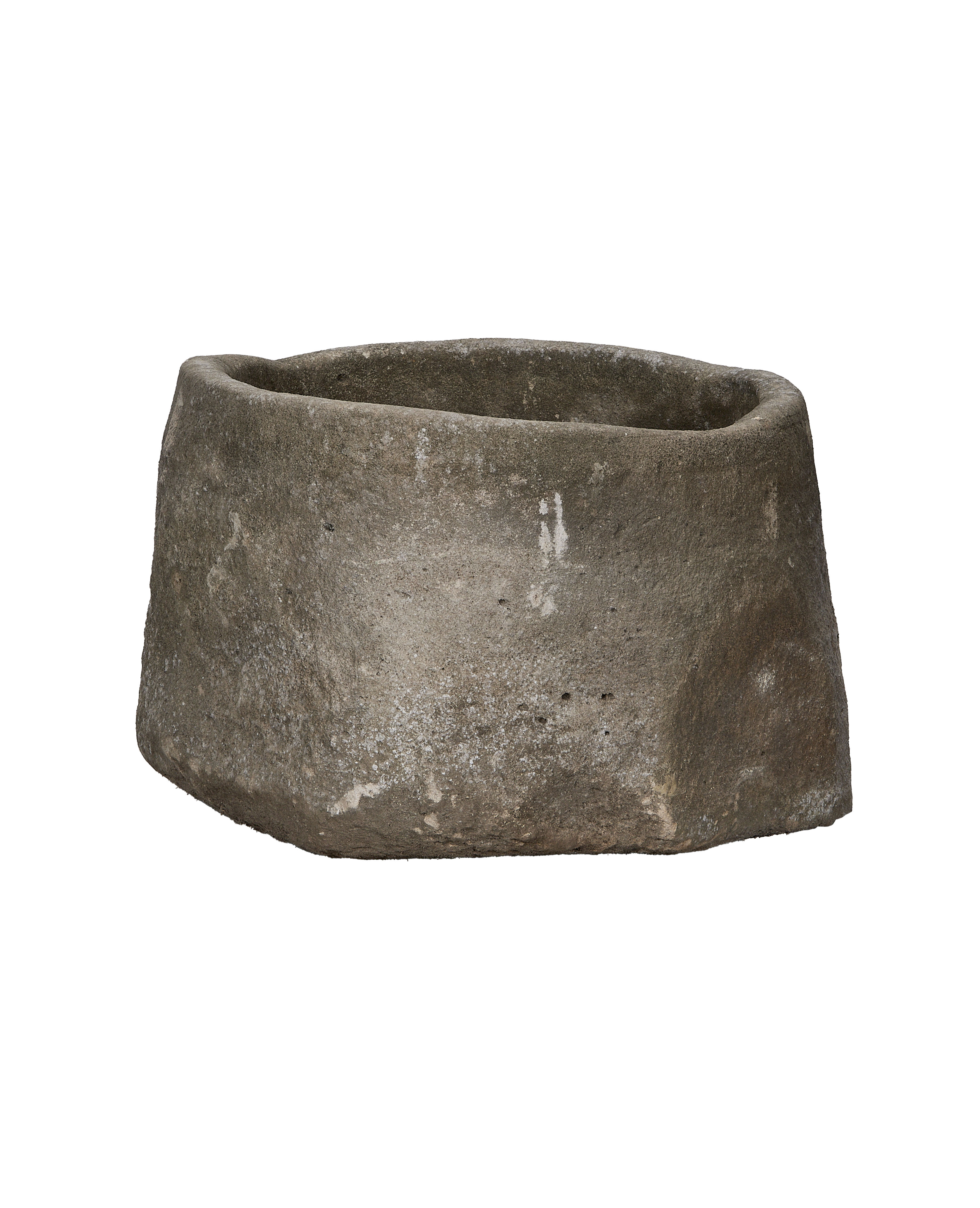 Vintage Indonesian limestone trough, round, showing detailed weathered gray surface texture.