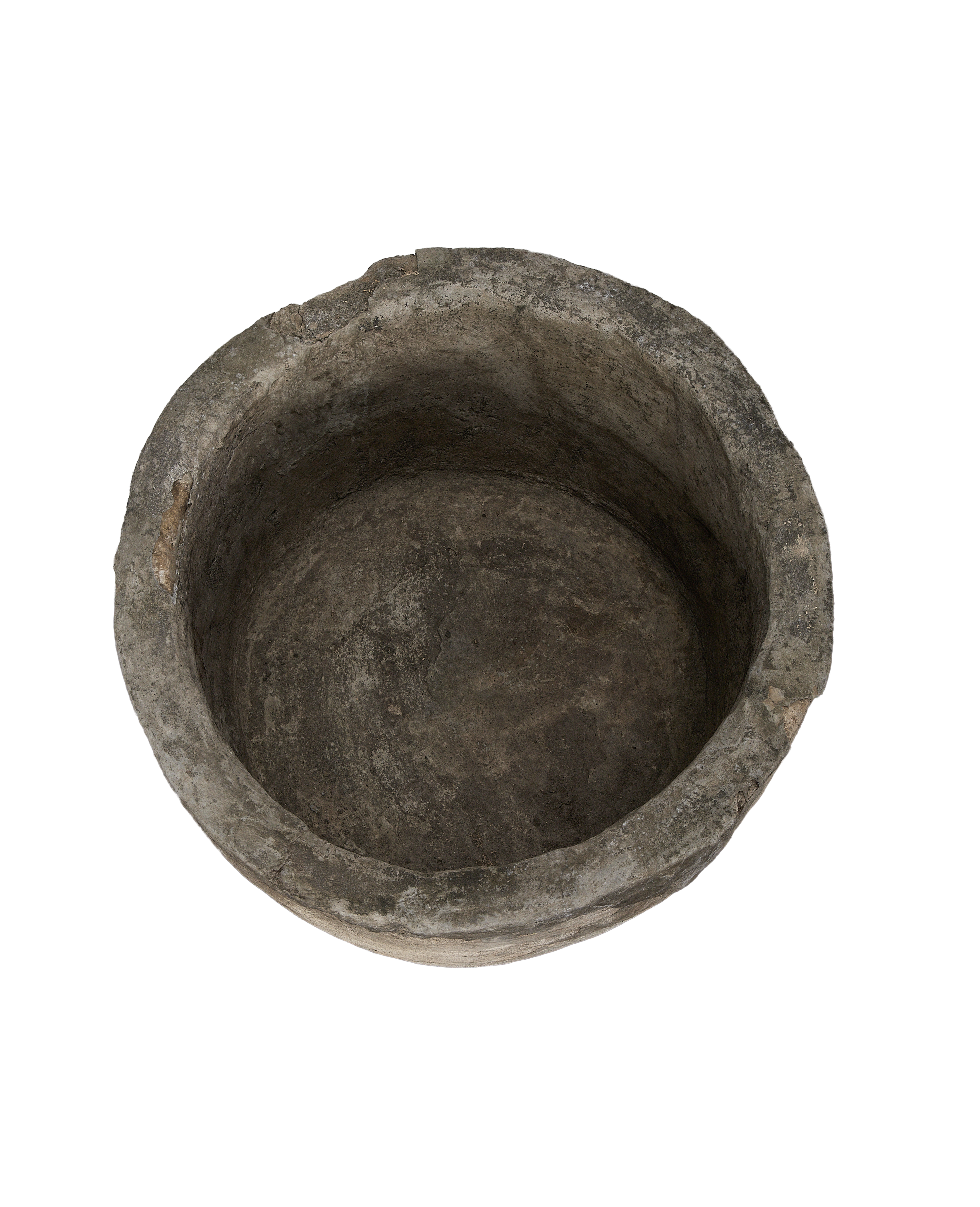 Vintage Indonesian round limestone trough, top-down view showing interior texture and condition.