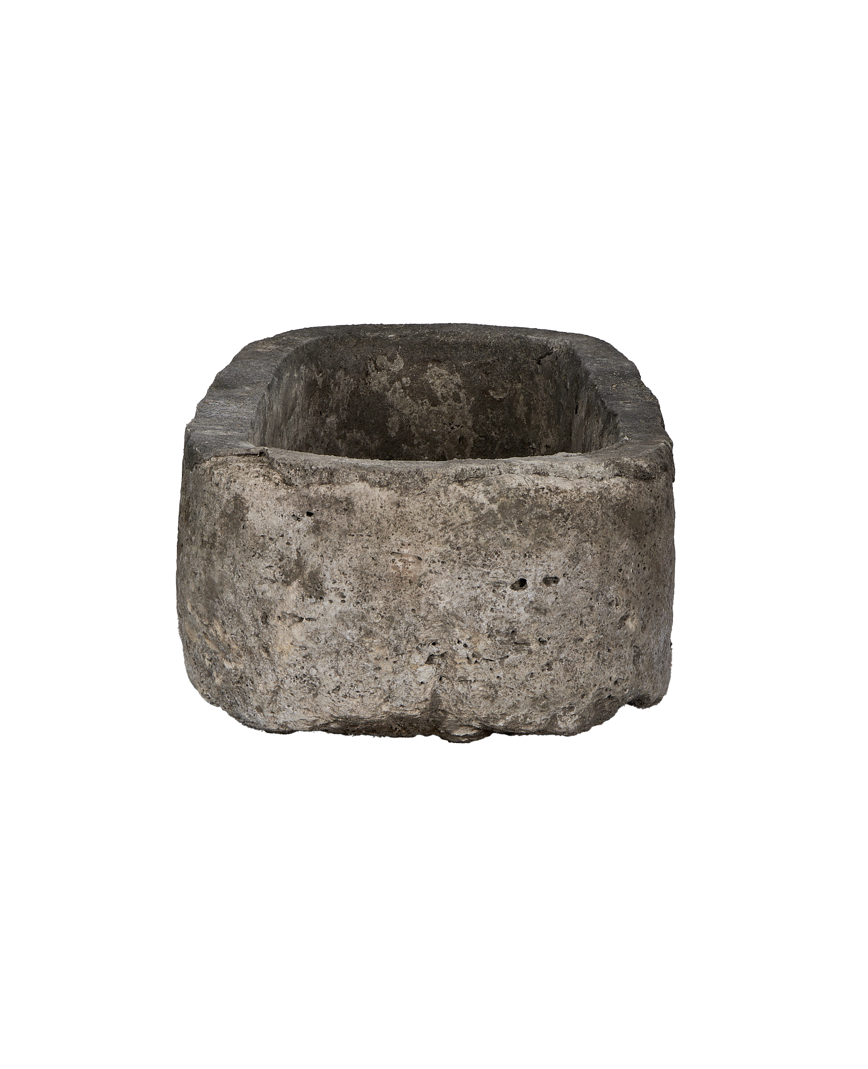 Vintage oblong limestone trough from Indonesia, showing rough exterior texture and sturdy build.