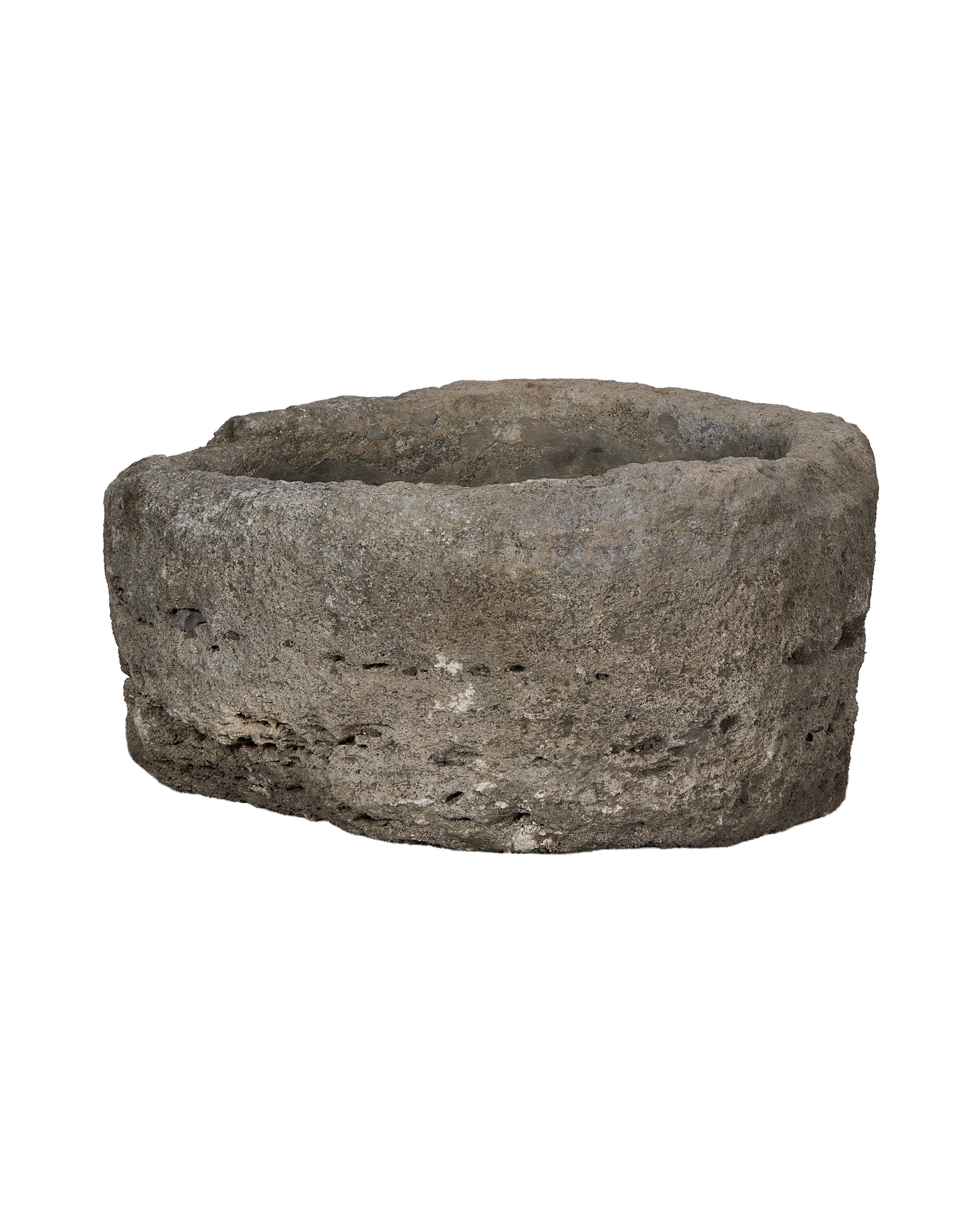 Vintage Indonesian round limestone trough, showing weathered texture and natural imperfections.