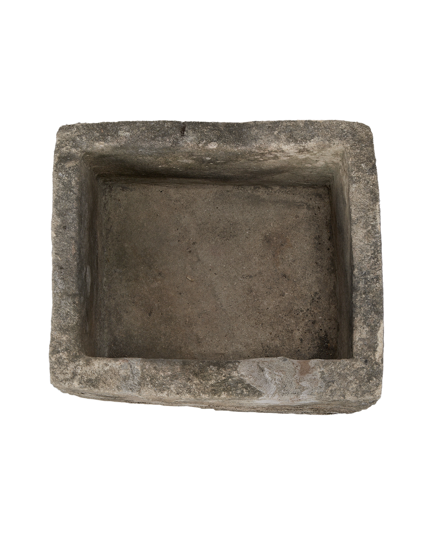 Vintage Indonesian rectangular limestone trough, top view inside its weathered, textured interior.